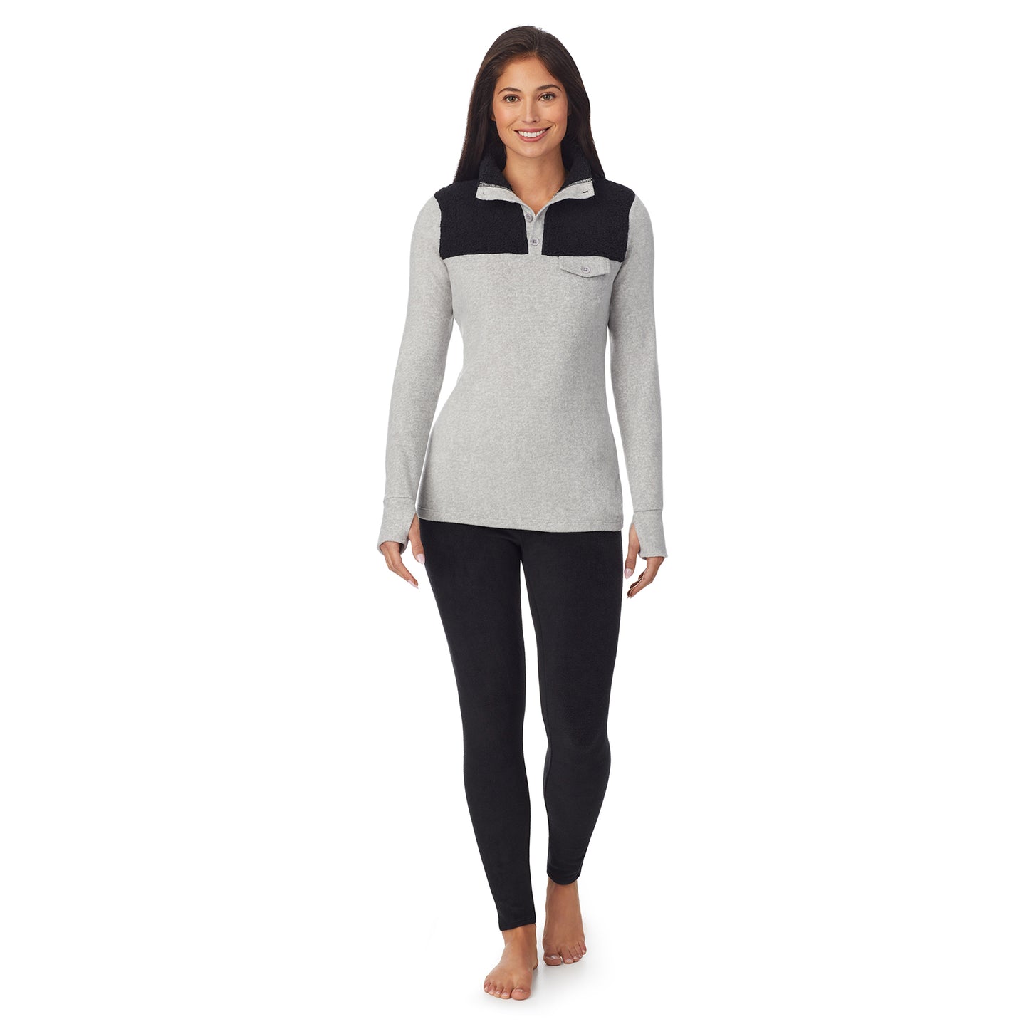 Light Grey Heather; Model is wearing size S. She is 5'8.5", Bust 32", Waist 25", Hips 36".@a lady wearing grey long sleeve mixed media mock !59% Polyester, 35% Recycled Polyester, 6% Spandex!