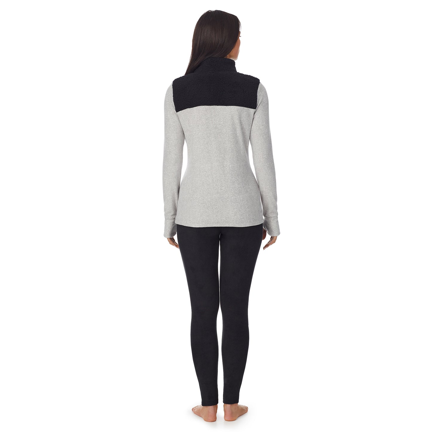 Light Grey Heather; Model is wearing size S. She is 5'8.5", Bust 32", Waist 25", Hips 36".@a lady wearing grey long sleeve mixed media mock !59% Polyester, 35% Recycled Polyester, 6% Spandex!