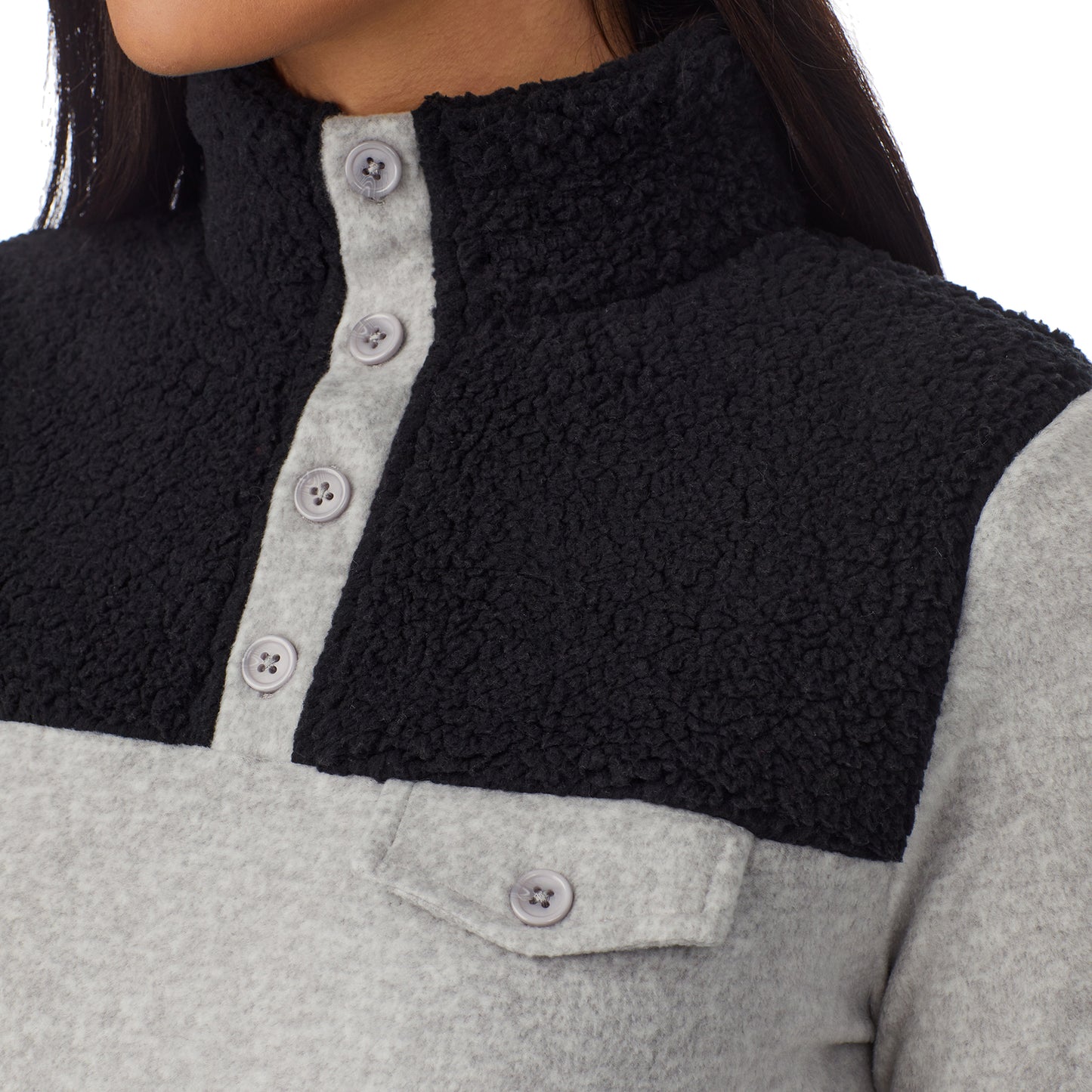 Light Grey Heather; Model is wearing size S. She is 5'8.5", Bust 32", Waist 25", Hips 36".@upper body of a lady wearing grey long sleeve mixed media mock !59% Polyester, 35% Recycled Polyester, 6% Spandex!