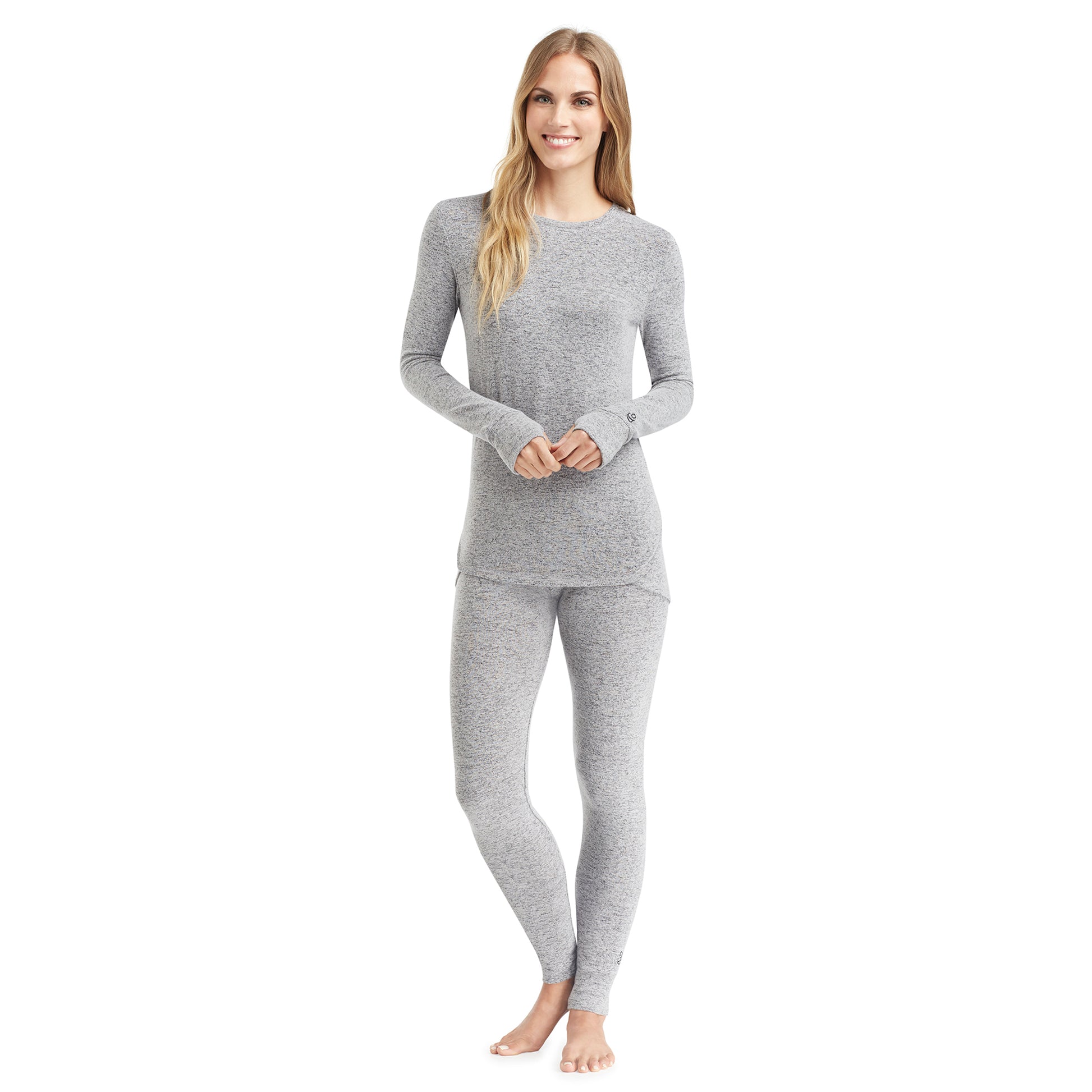 A lady wearing a marled grey  long sleeve crew.