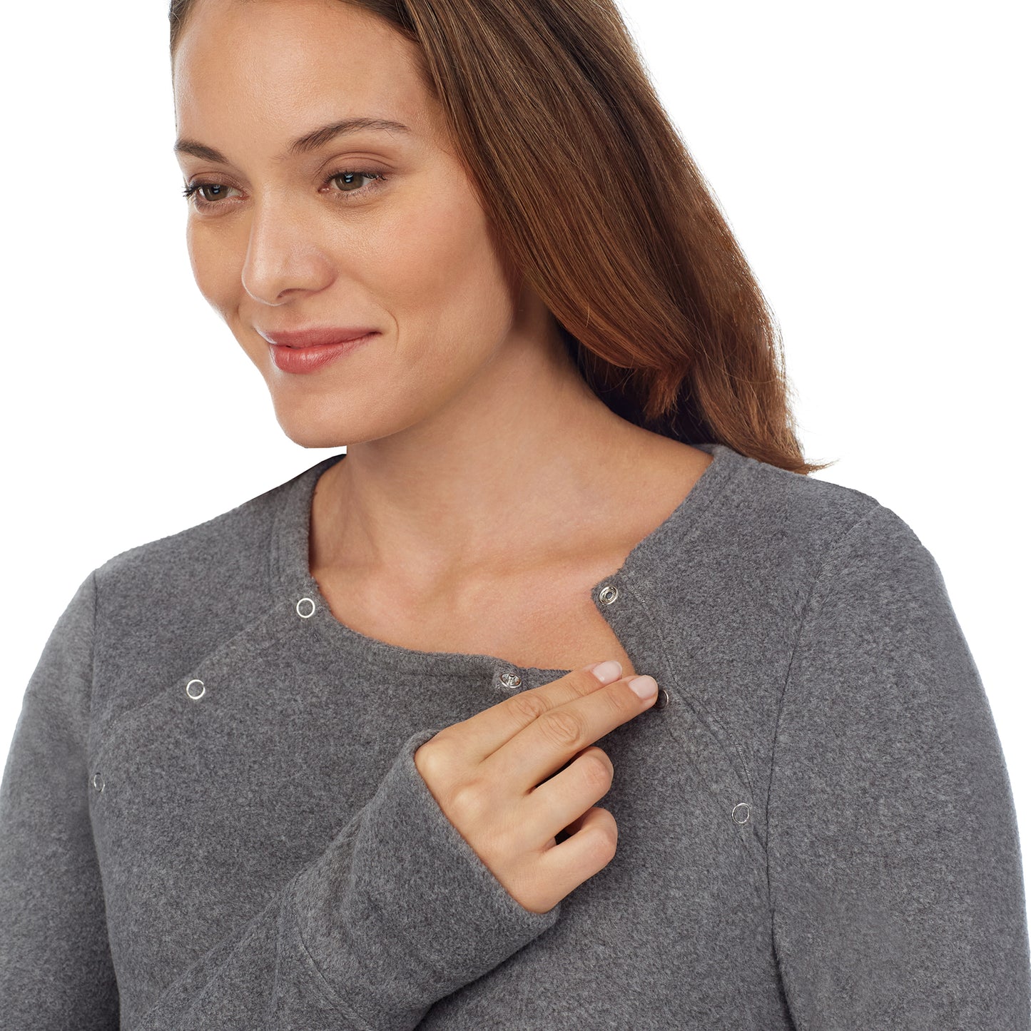 Charcoal Heather; Model is wearing a size S. She is 5’10”, Bust 34”, Waist 26”, Hips 36”. @upper body of a lady wearing a grey maternity snap front crew. #Model is wearing a maternity bump.
