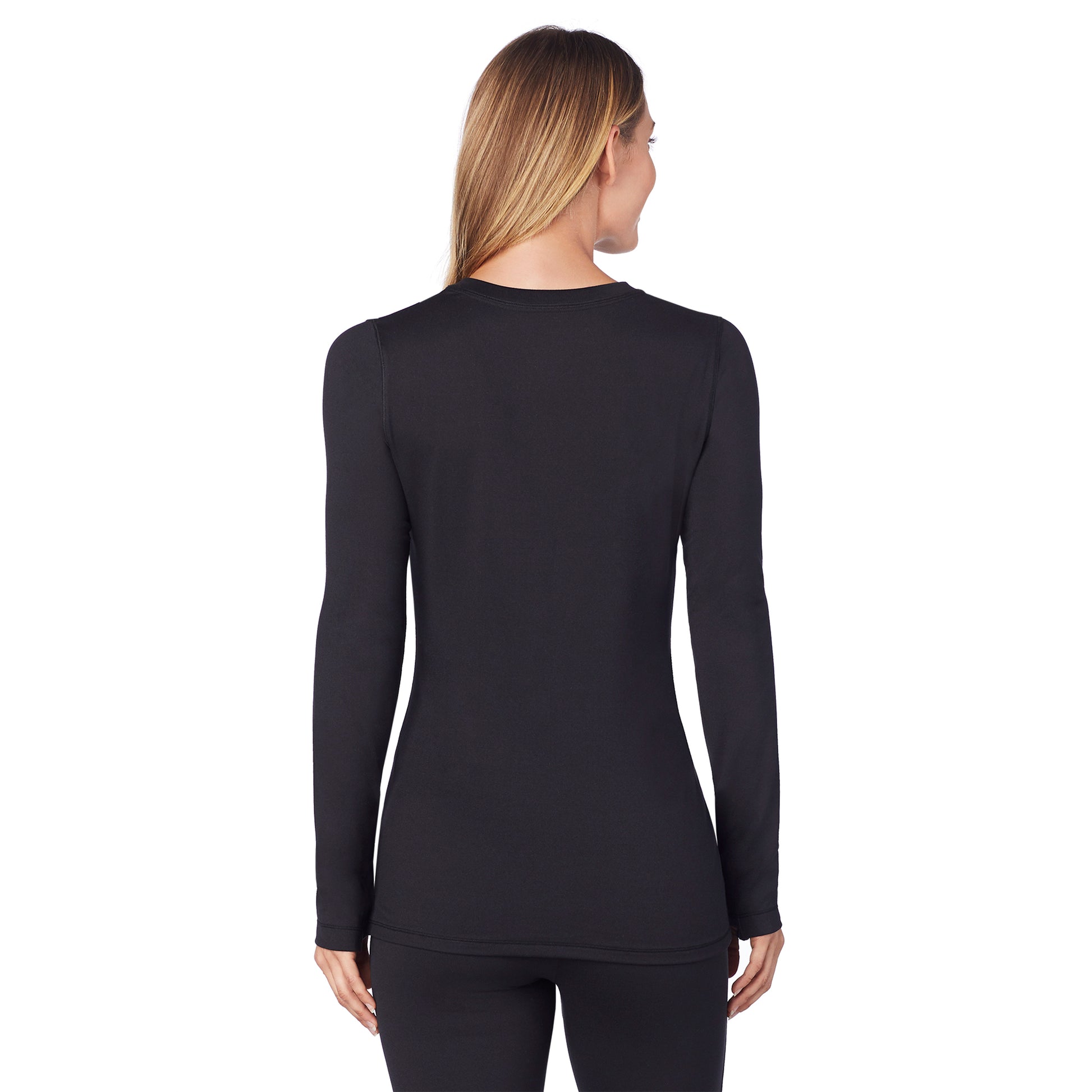 Upper body of a lady wearing black long sleeve crew.