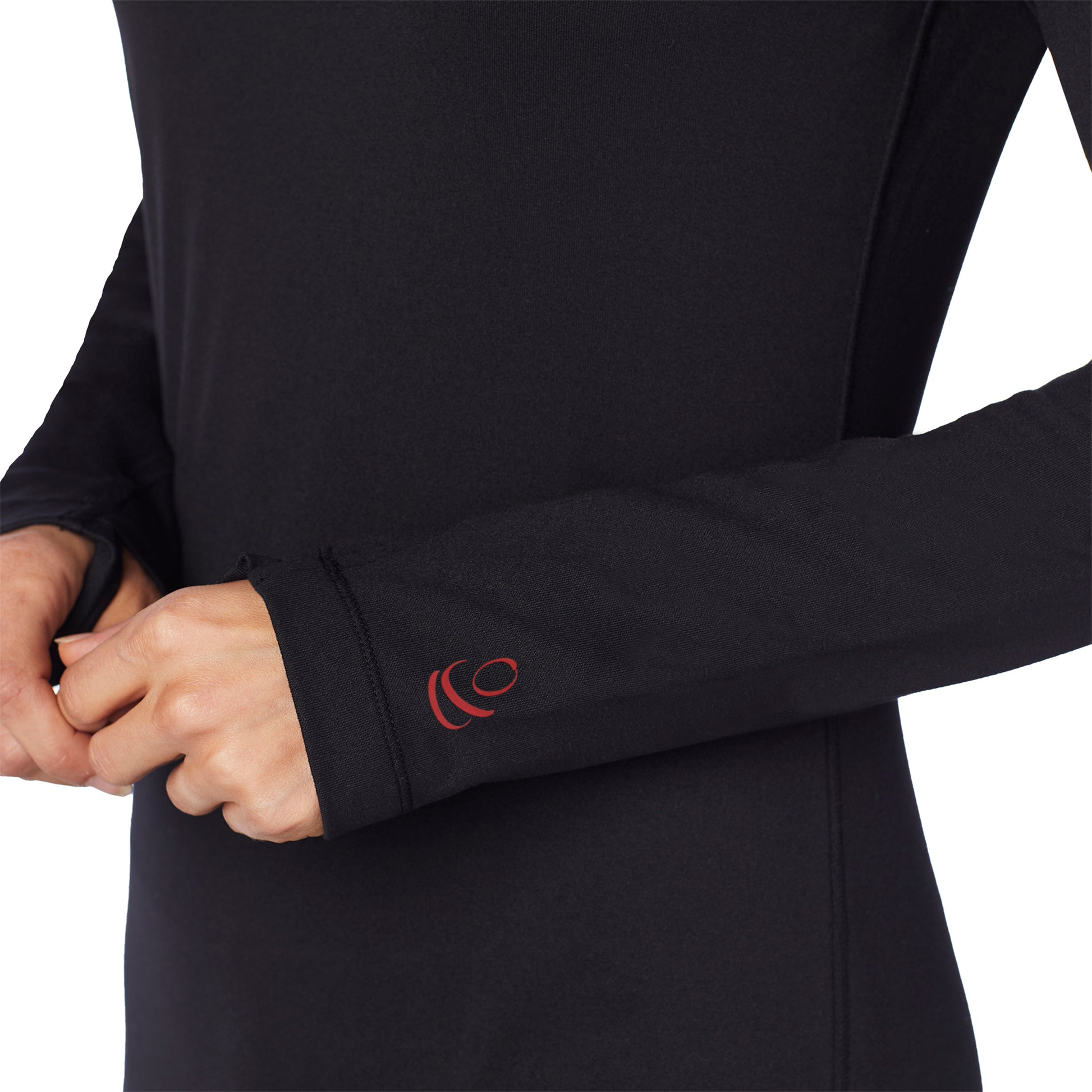Upper body of a lady wearing black long sleeve crew.