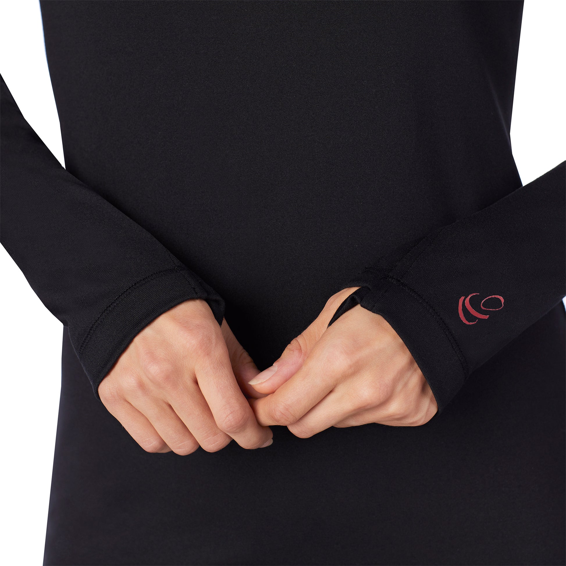 Upper body of a lady wearing black long sleeve crew.