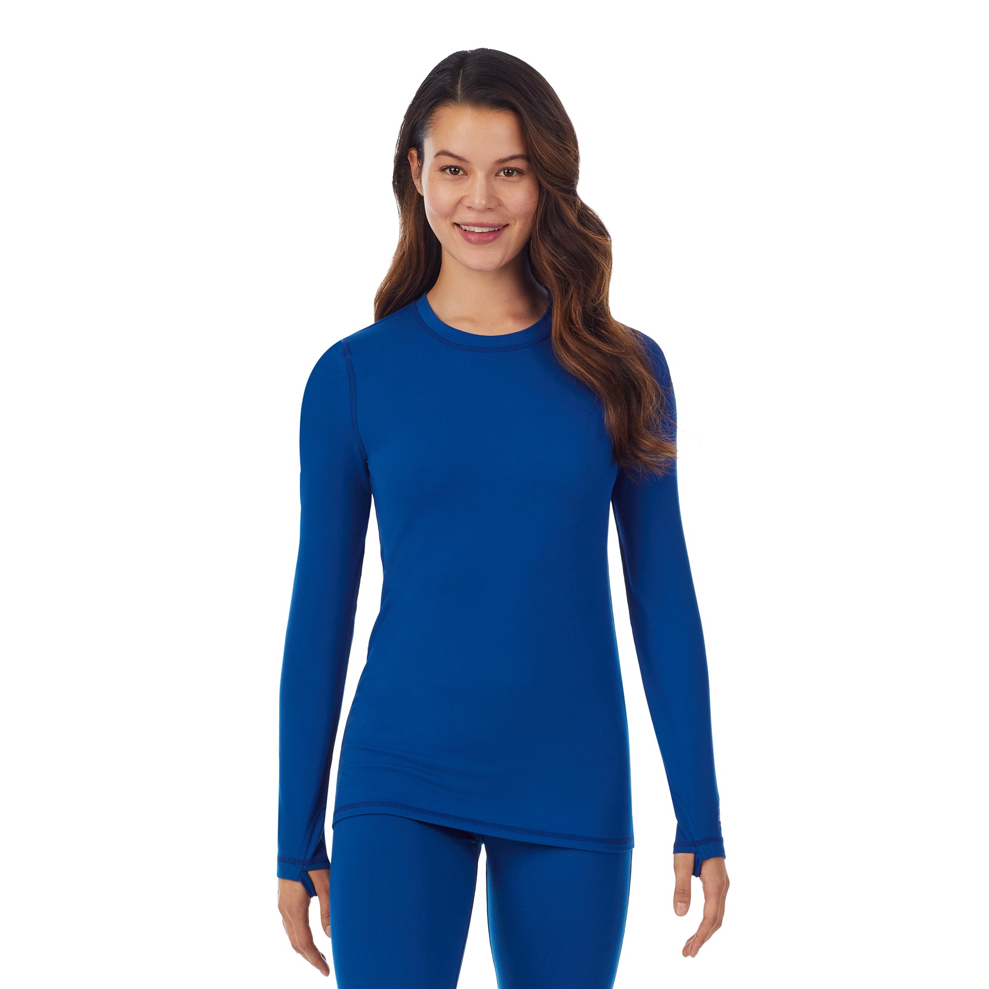 Upper body of a lady wearing blue long sleeve crew.