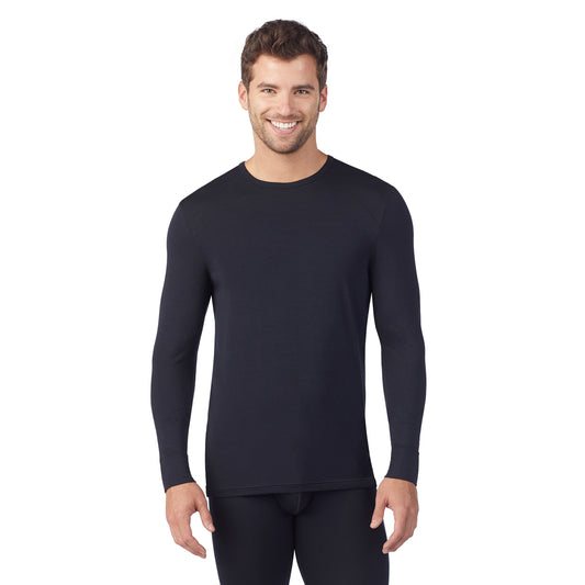 Black; Model is wearing size M. He is 6'1", Waist 31", Inseam 33".@upper body of A man wearing black long sleeve crew