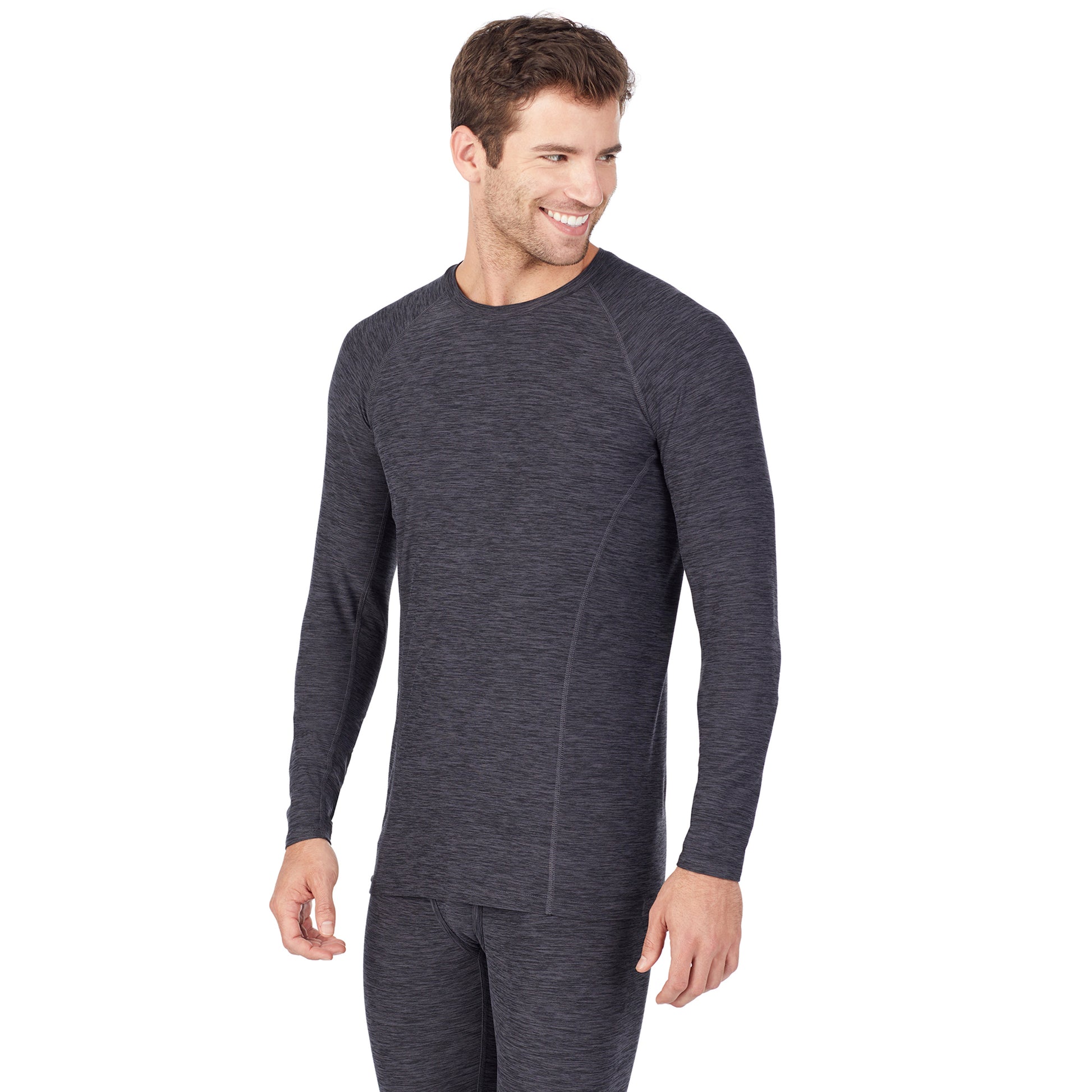 A man wearing greylong sleeve crew t-shirt