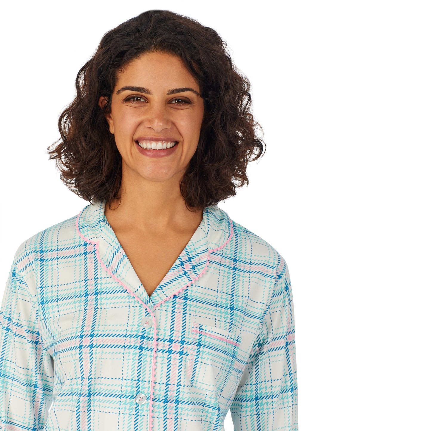 Aqua Pink Multi Plaid; Model is wearing size S. She is 5’9”, Bust 32”, Waist 24”, Hips 34.5”. @A lady wearing a white long sleeve pajama set with pink and blue plaid.