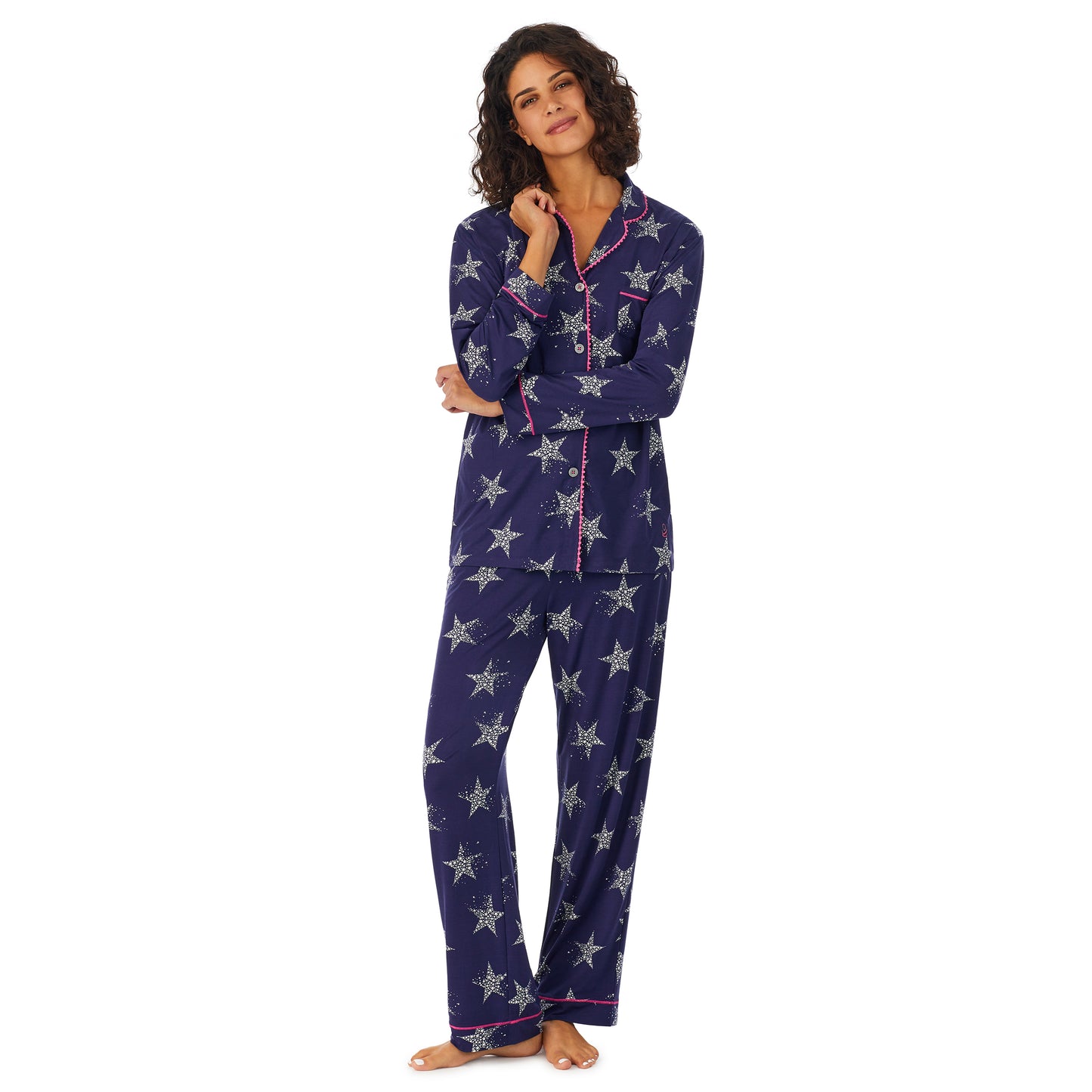Navy Star; Model is wearing size S. She is 5’9”, Bust 32”, Waist 24”, Hips 34.5”. @A lady wearing a dark blue long sleeve pajama set with white stars.