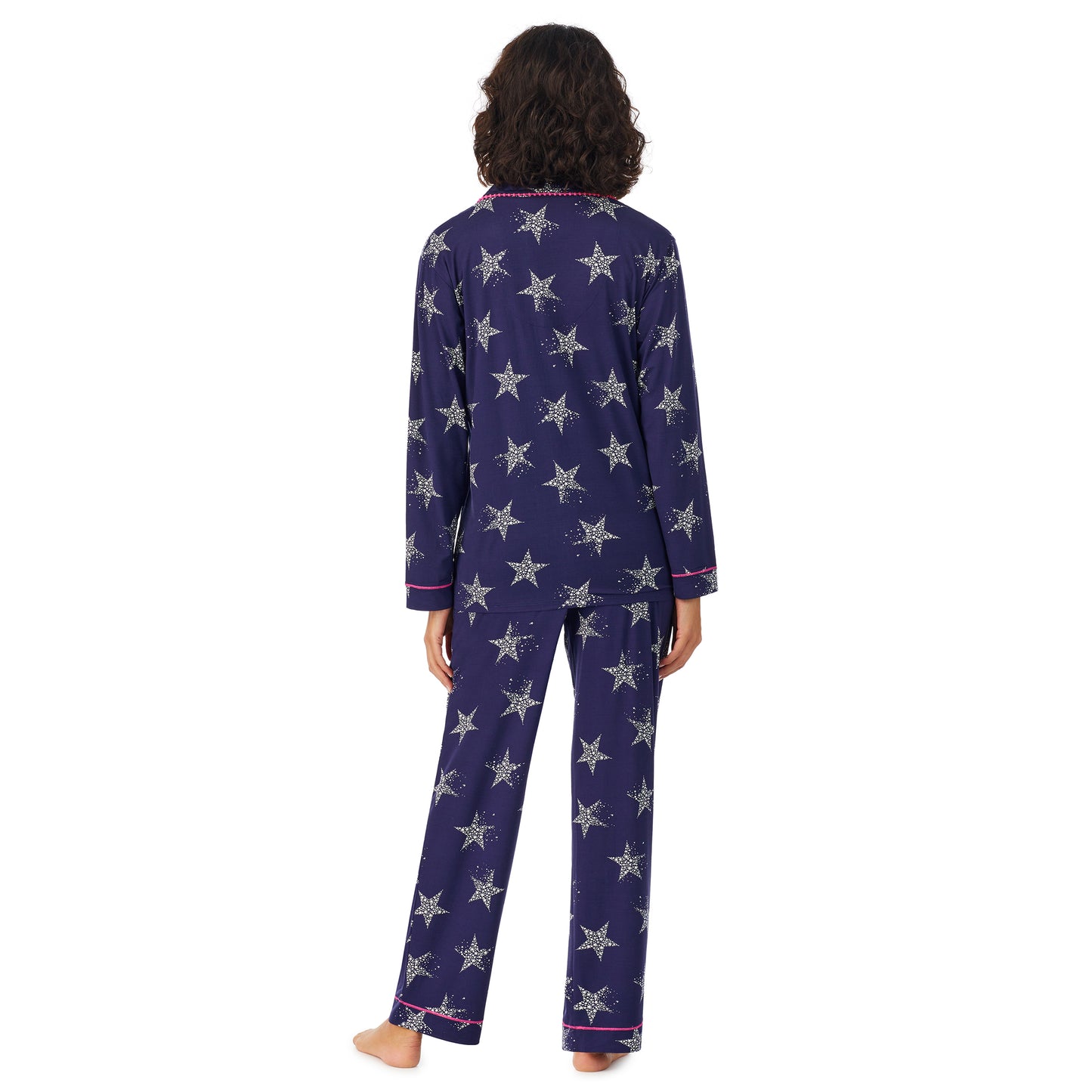 Navy Star; Model is wearing size S. She is 5’9”, Bust 32”, Waist 24”, Hips 34.5”. @A lady wearing a dark blue long sleeve pajama set with white stars.
