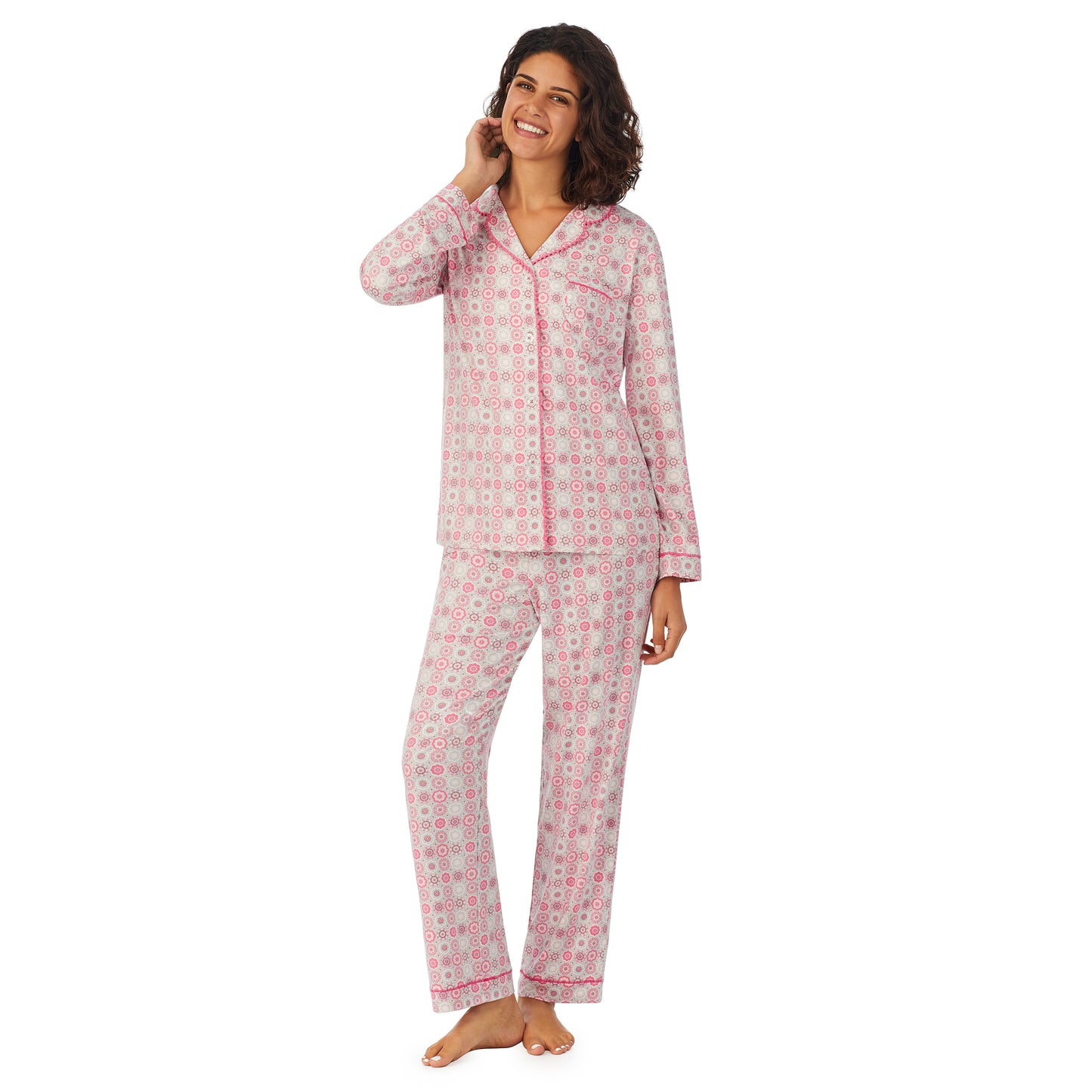 Pink Geo; Model is wearing size S. She is 5’9”, Bust 32”, Waist 24”, Hips 34.5”. @A lady wearing a long sleeve pajama set with pink geo pattern.