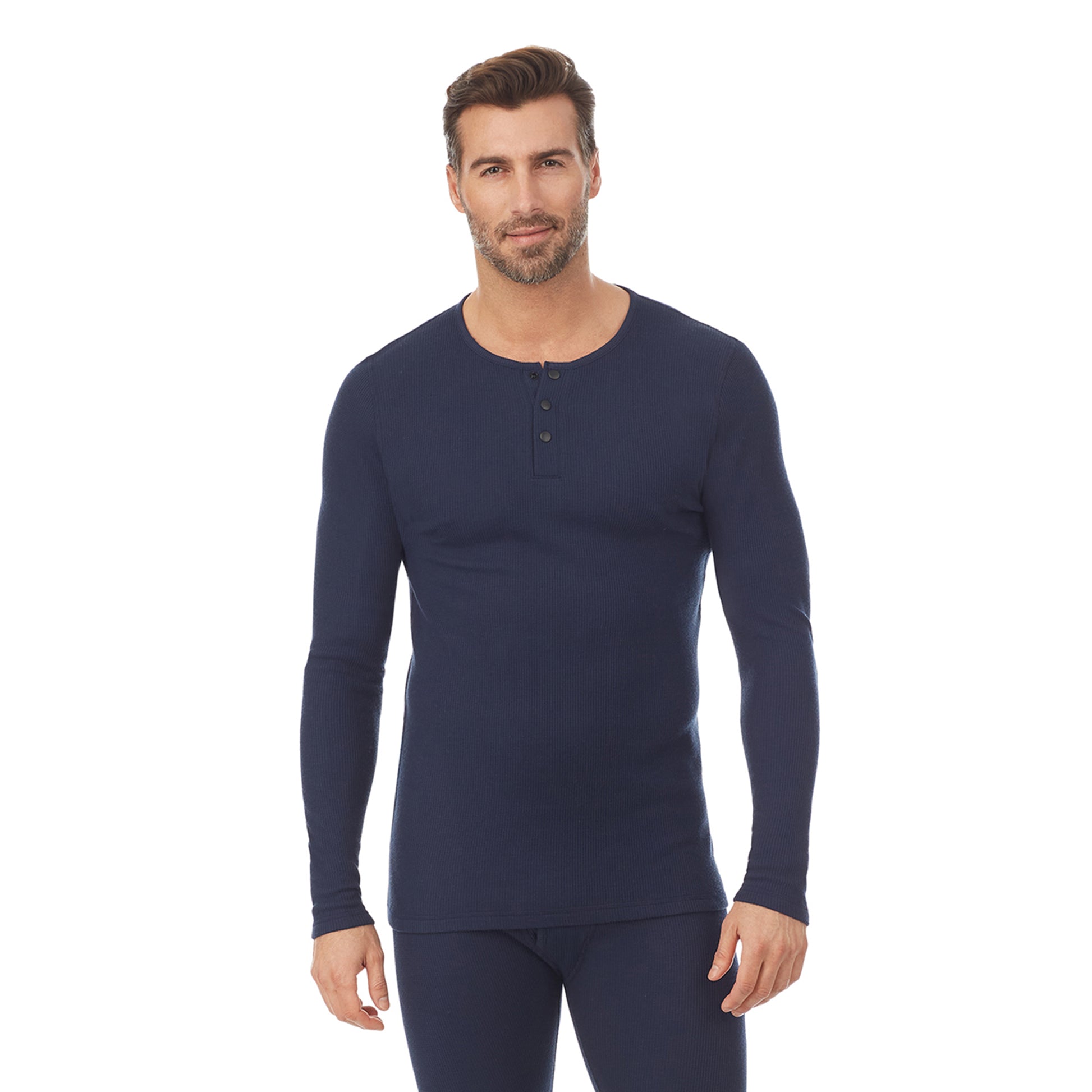 A man wearing a navy blue long sleeve henley t-shirt.
