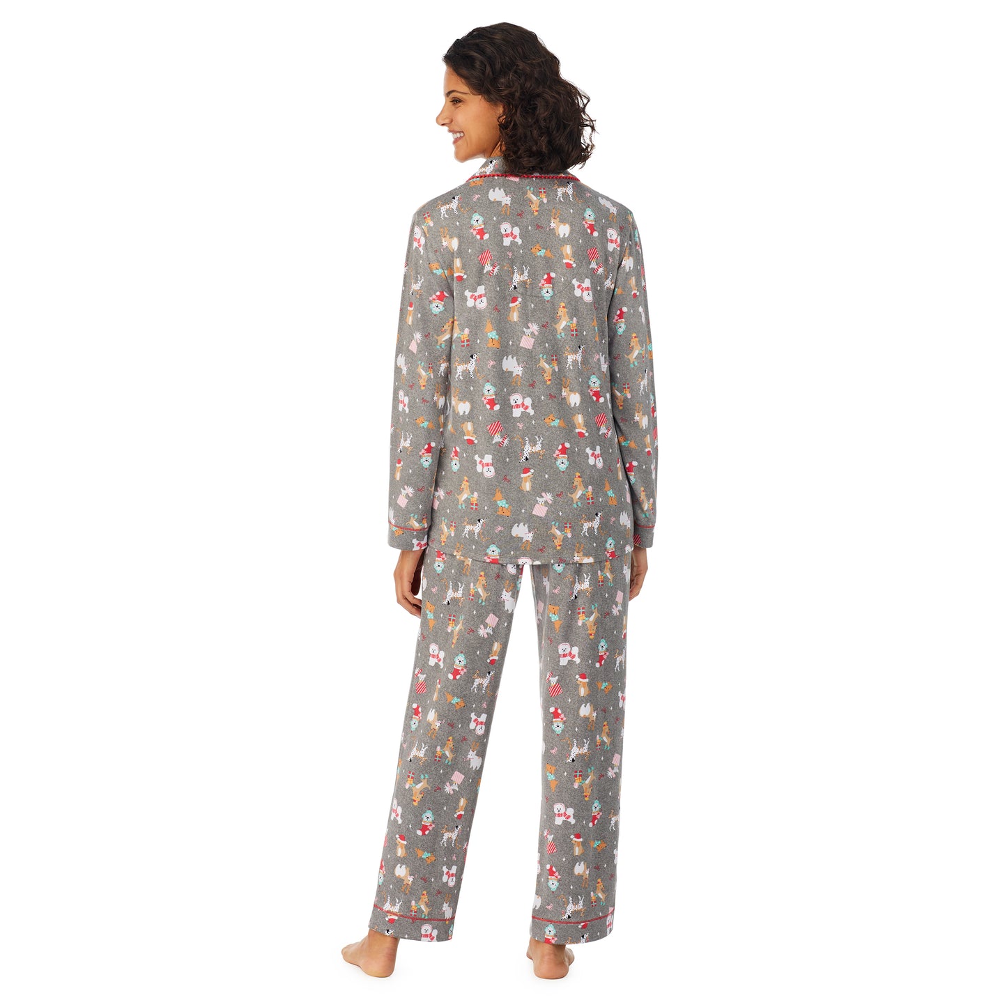 Grey Holiday Dogs; Model is wearing size S. She is 5’9”, Bust 32”, Waist 24”, Hips 34.5”. @A lady wearing a grey long sleeve pajama set with dogs pattern.