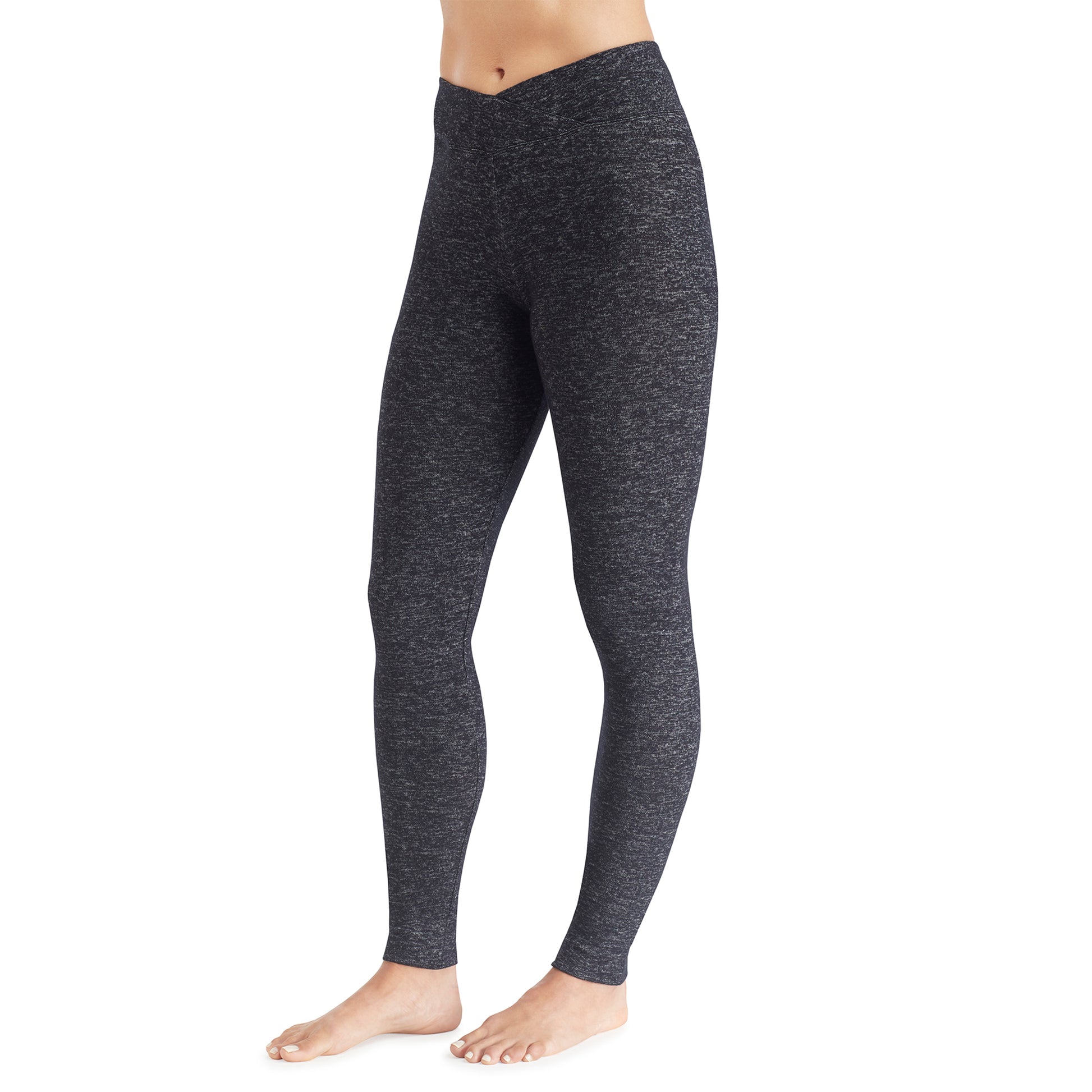 A lady wearing a marled dark charcoal legging.