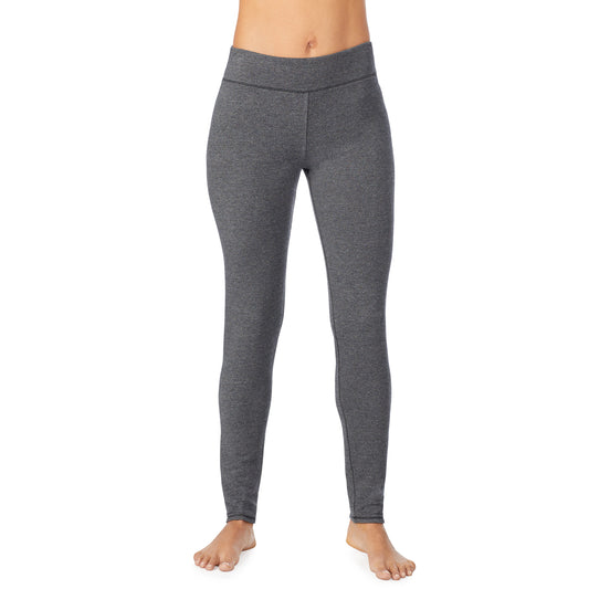 A lady wearing a charcoal heather legging.