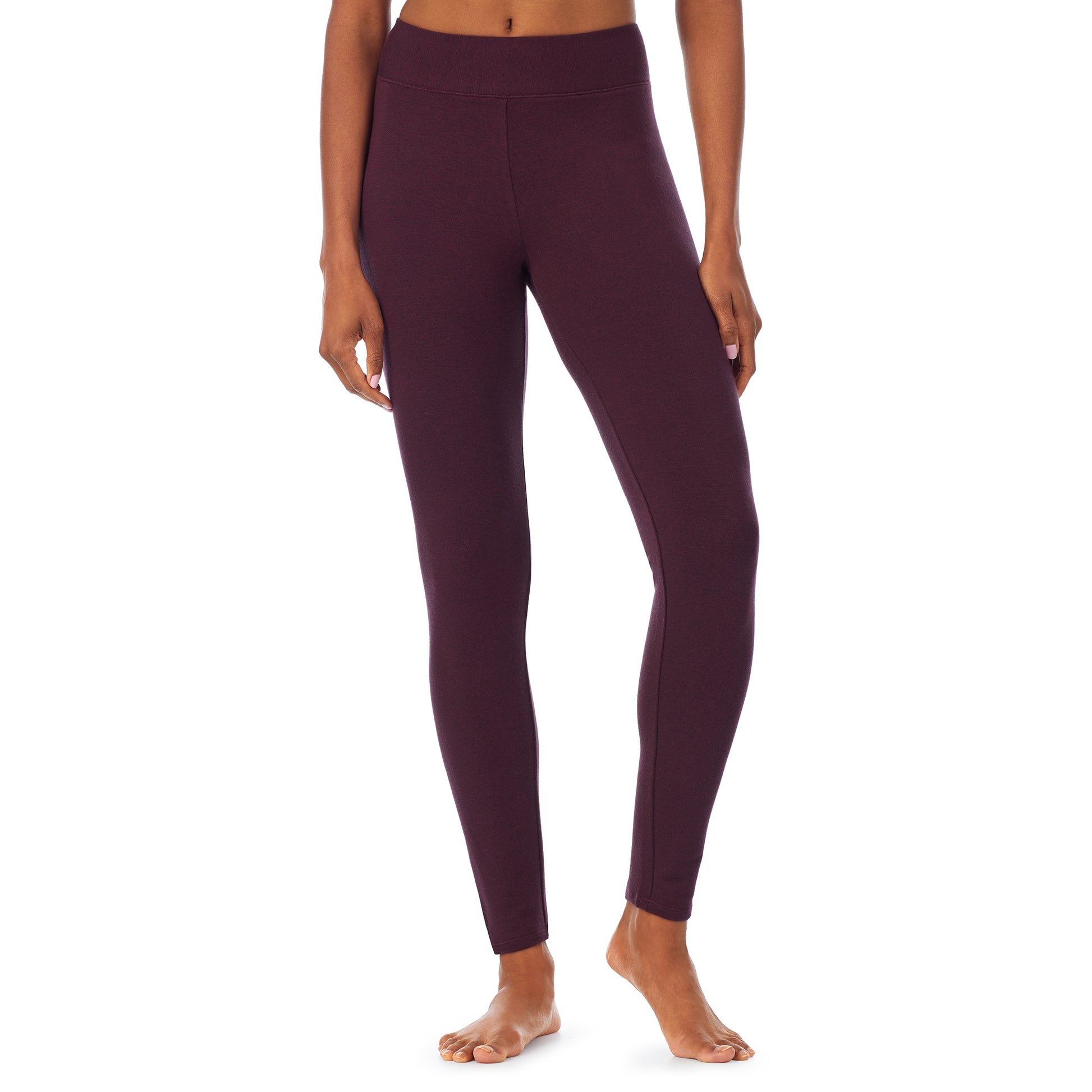 A lady wearing a grape heather legging.