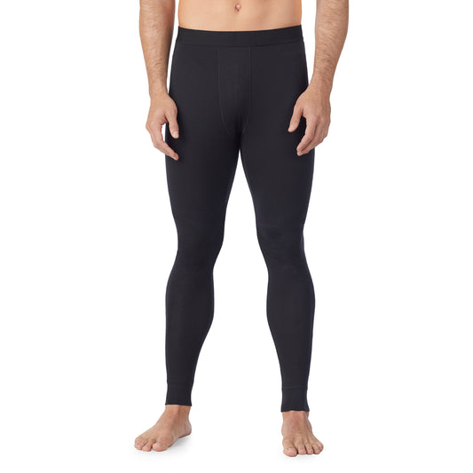 lower body of a man wearing black pant