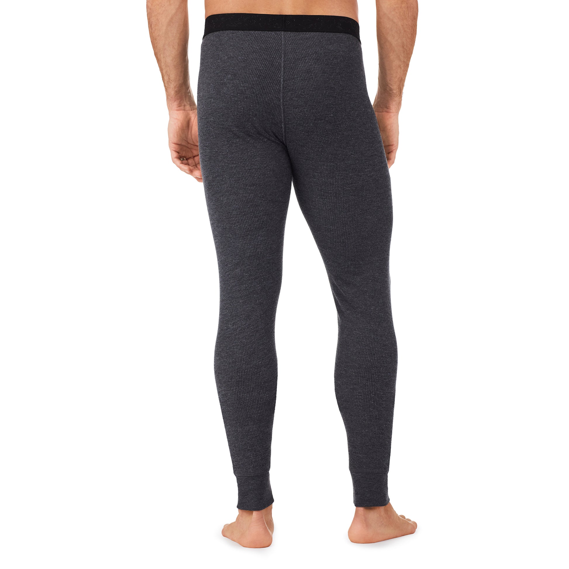 A man wearing a charcoal heather waffle thermal pant big & tall..