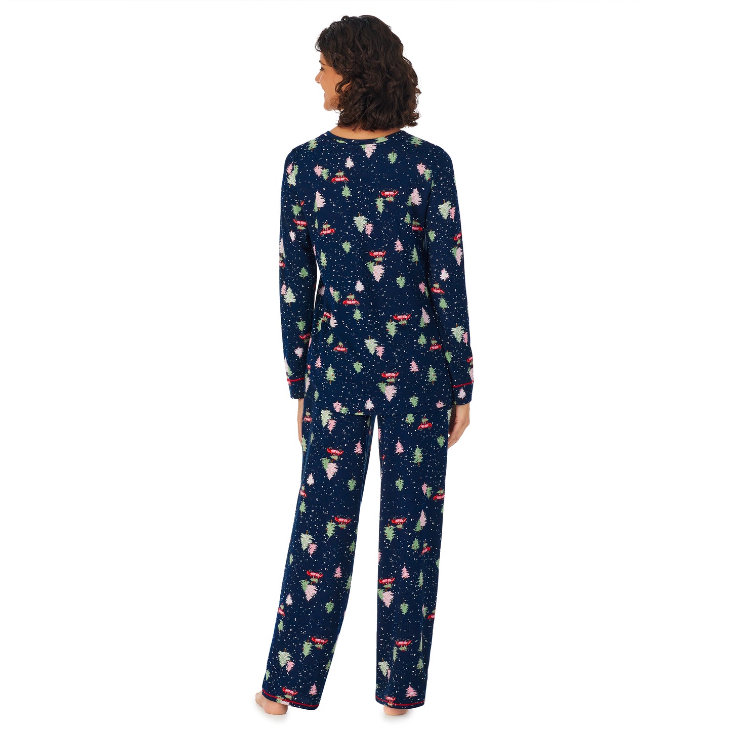 Navy Tree Hunting; Model is wearing size S. She is 5’9”, Bust 32”, Waist 24”, Hips 34.5”. @A lady wearing a navy long sleeve pajama set with tree hunting pattern.