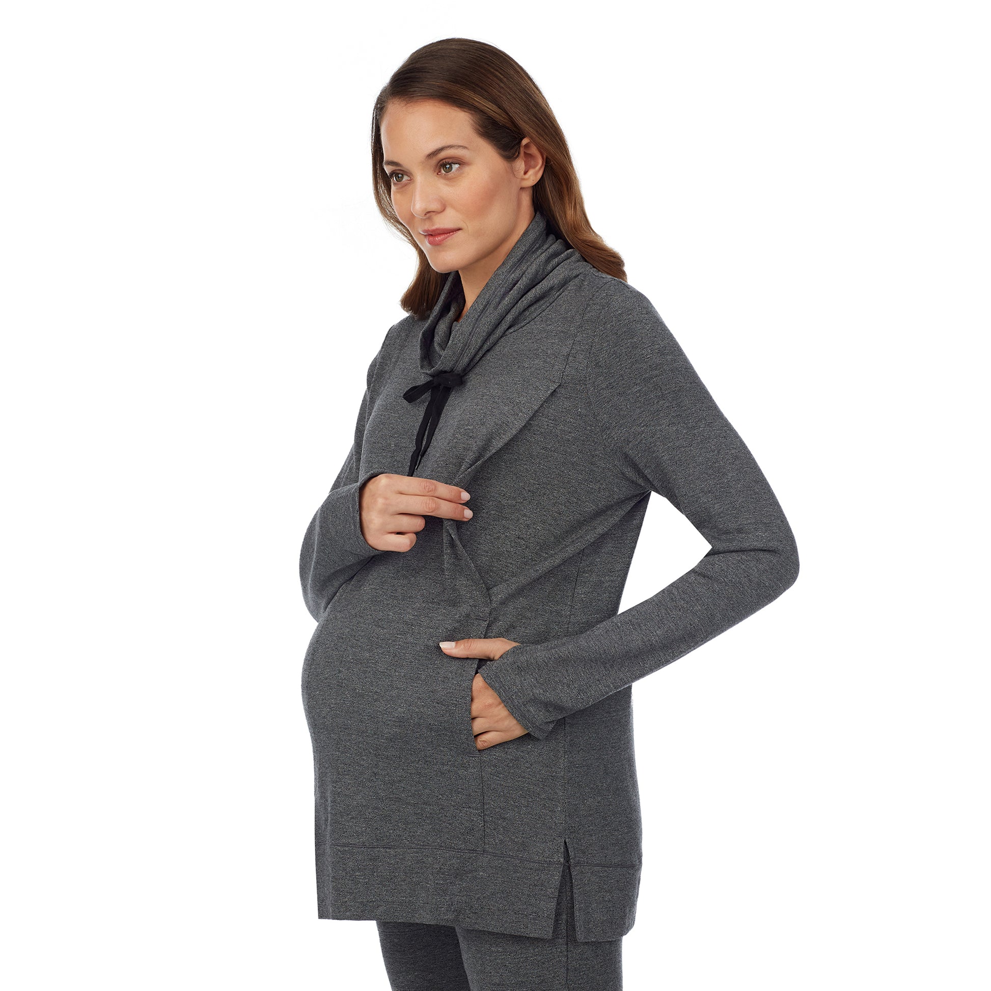 A lady wearing a charcoal heather long sleeve funnel neck tunic. #Model is wearing a maternity bump.