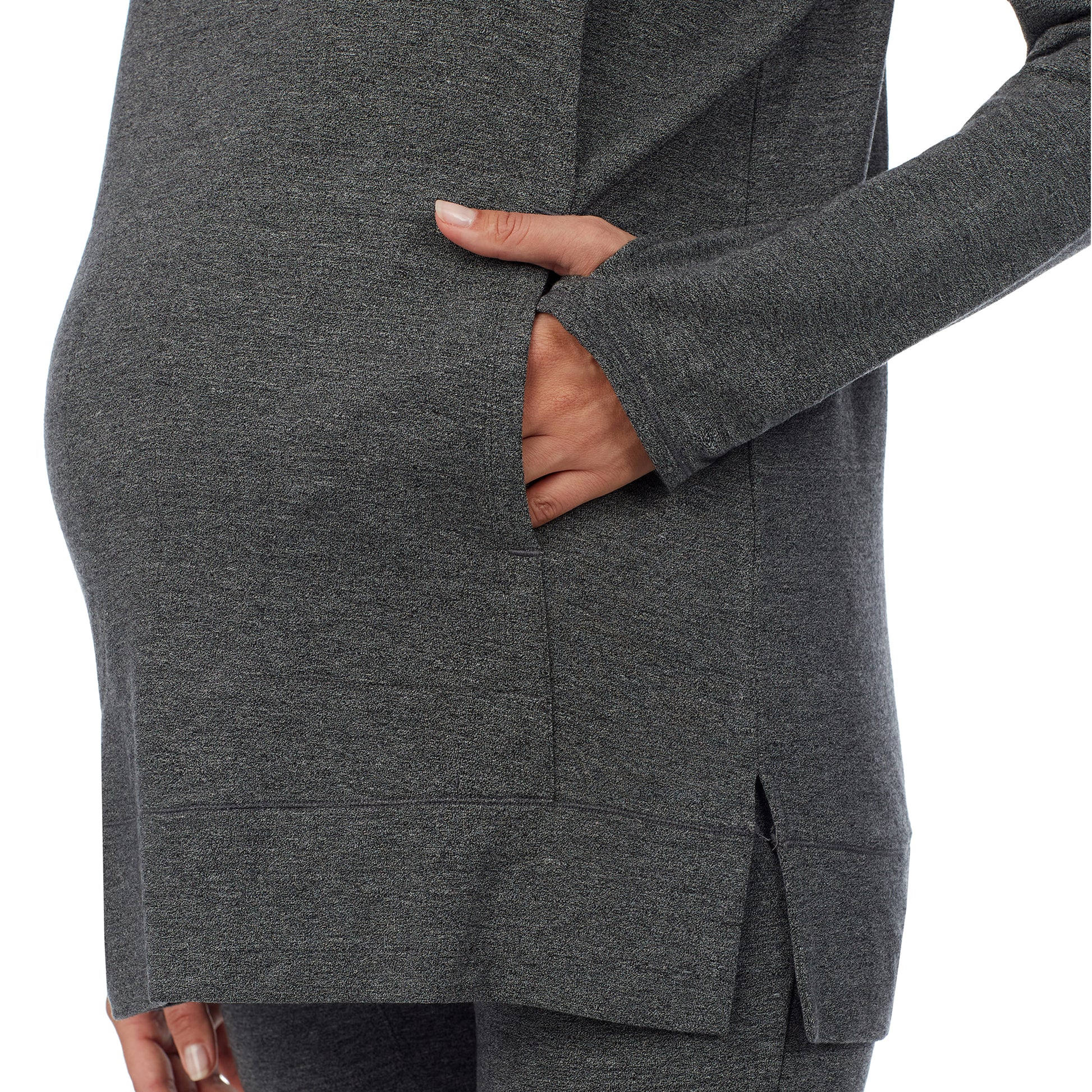 A lady wearing a charcoal heather long sleeve funnel neck tunic. #Model is wearing a maternity bump.