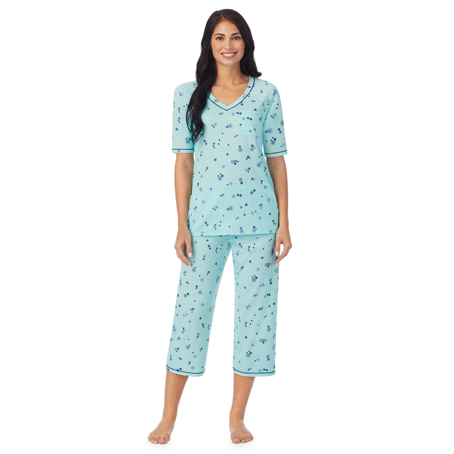 Mint Ditsy Floral;Model is wearing size S. She is 5'8.5", Bust 32", Waist 25", Hips 36".@ A lady wearingCuddl Smart Elbow Sleeve Top with Cropped Pant Pajama Set with Mint Ditsy Floral print