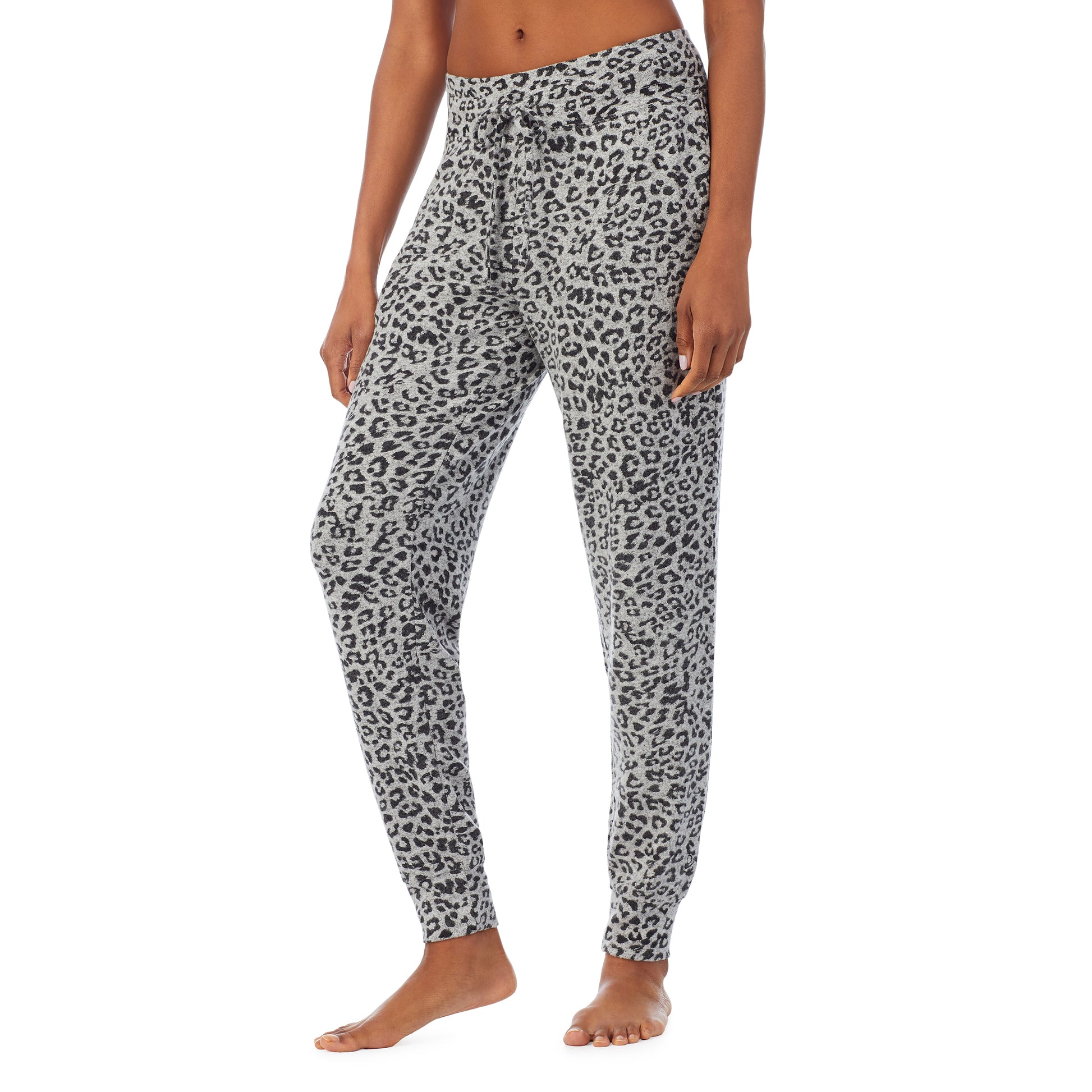 lower body of a lady wearing grey jogger with animal print