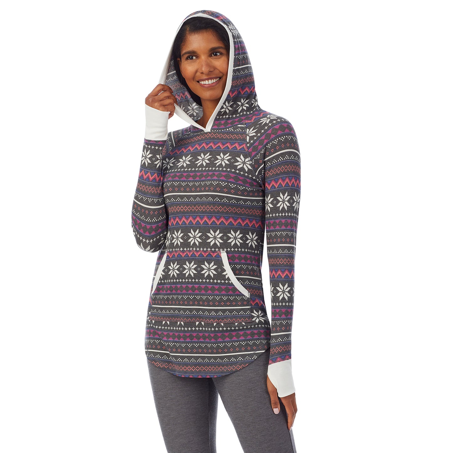 Grey Multi Fairisle; Model is wearing size S. She is 5’10”, Bust 34”, Waist 24”, Hips 34”. @A lady wearing a grey multi fairisle long sleeve hoodie tunic.