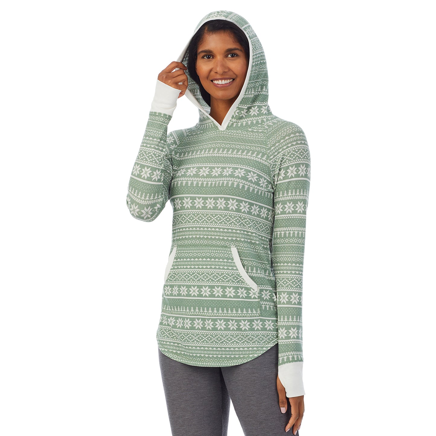 Seagrass Fairisle; Model is wearing size S. She is 5’10”, Bust 34”, Waist 24”, Hips 34”. @A lady wearing a seagrass fairisle long sleeve hoodie tunic.