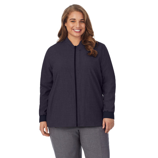 A lady wearing black scrub jacket plus.
