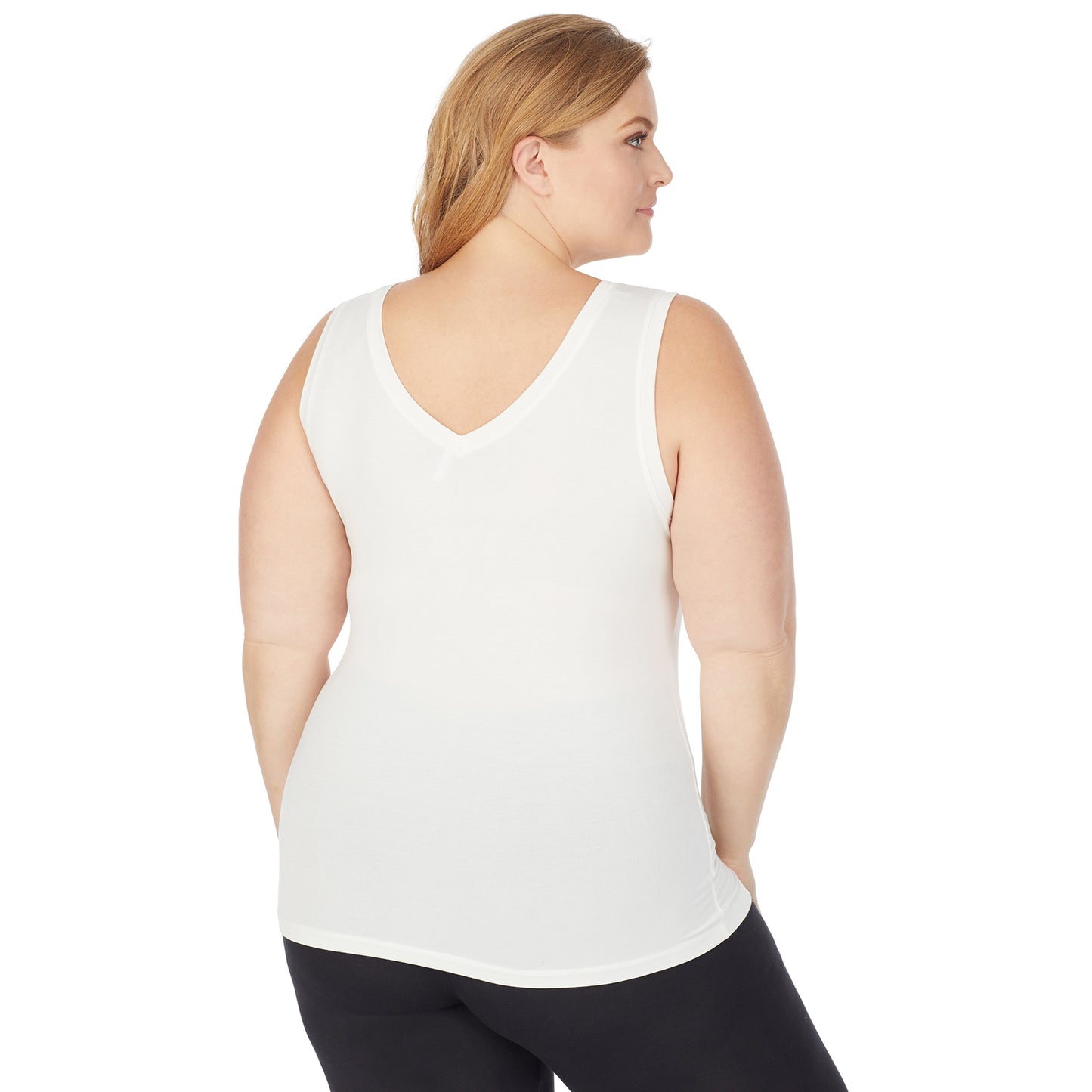 Ivory; Model is wearing size 1X. She is 5'9", Bust 38", Waist 36", Hips 48.5". @A lady wearing a ivory sleeveless reversible tank plus.