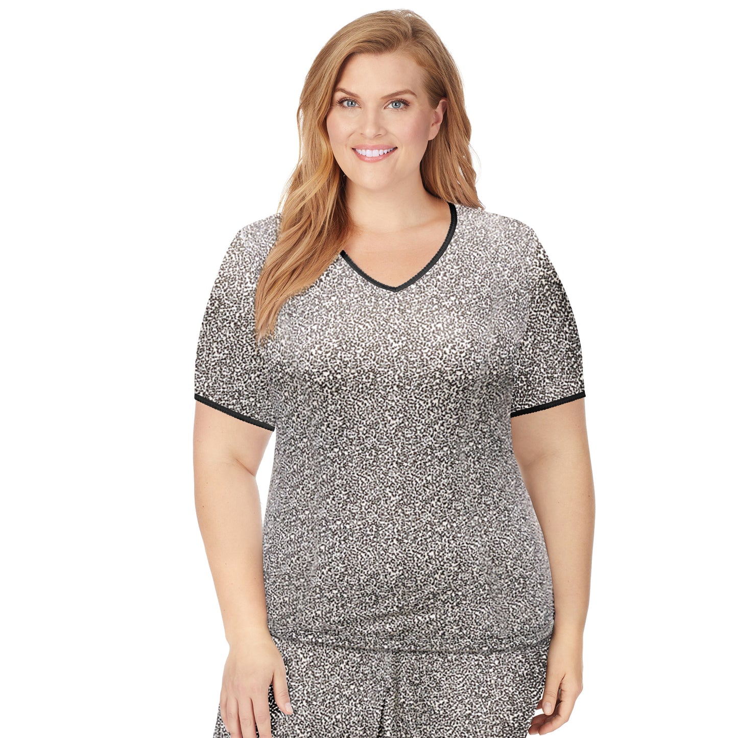 Cheetah; Model is wearing size 1X. She is 5'9", Bust 38", Waist 36", Hips 48.5". @A lady wearing a cheetah lace edge short sleeve V-Neck plus.