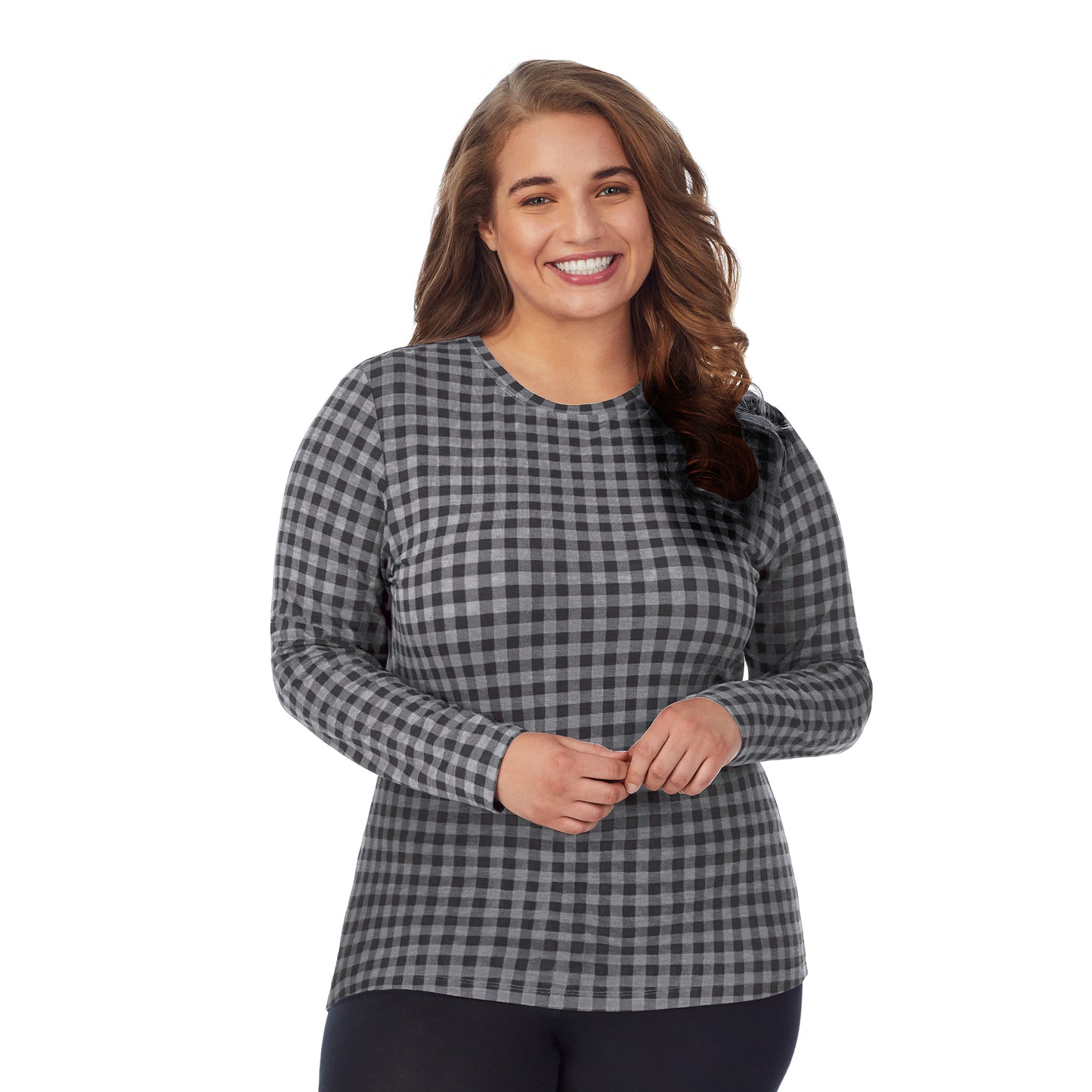 Tonal Buffalo; Model is wearing size 1X. She is 5'7", Bust 42.5", Waist 34.5", Hips 46". @A lady wearing a tonal buffalo long sleeve stretch crew plus.
