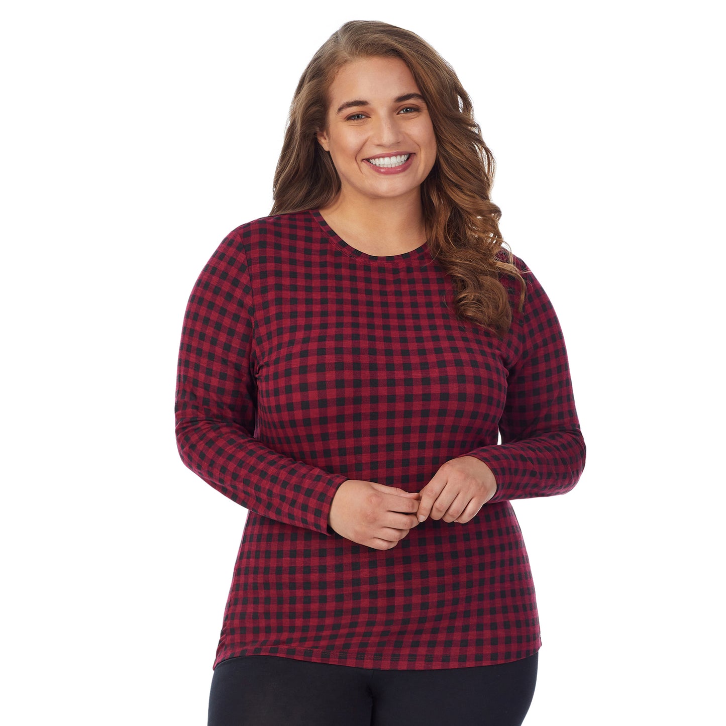 Rhubarb Buffalo; Model is wearing size 1X. She is 5'7", Bust 42.5", Waist 34.5", Hips 46". @A lady wearing a red buffalo long sleeve stretch crew plus.