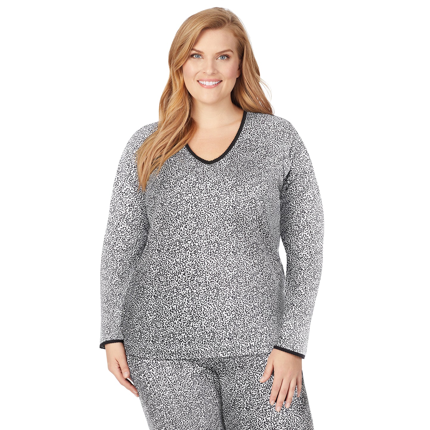 Cheetah; Model is wearing size 1X. She is 5'9", Bust 38", Waist 36", Hips 48.5". @A lady wearing a cheetah long sleeve lace edge V-neck plus.