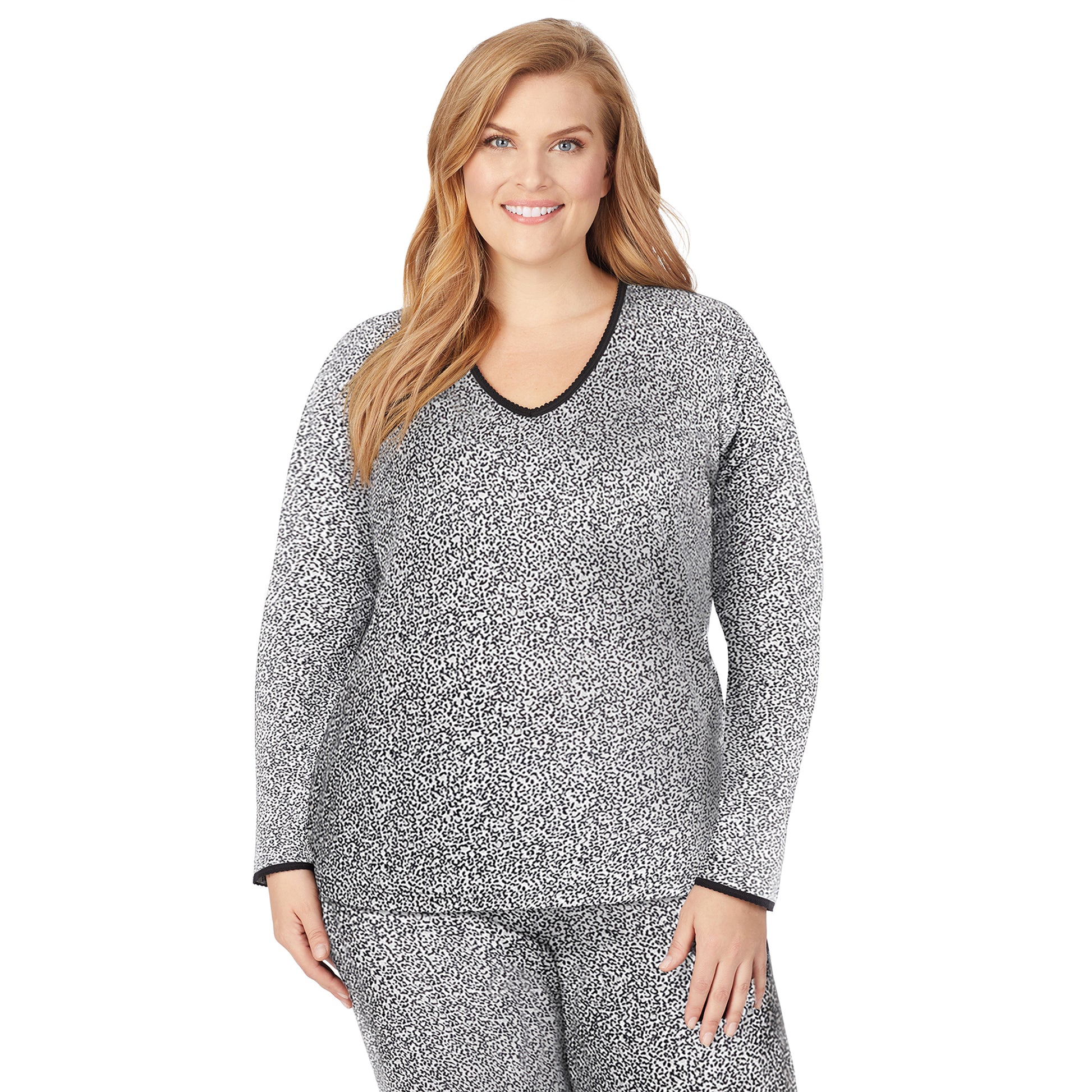 A lady wearing a cheetah long sleeve lace edge V-neck plus.