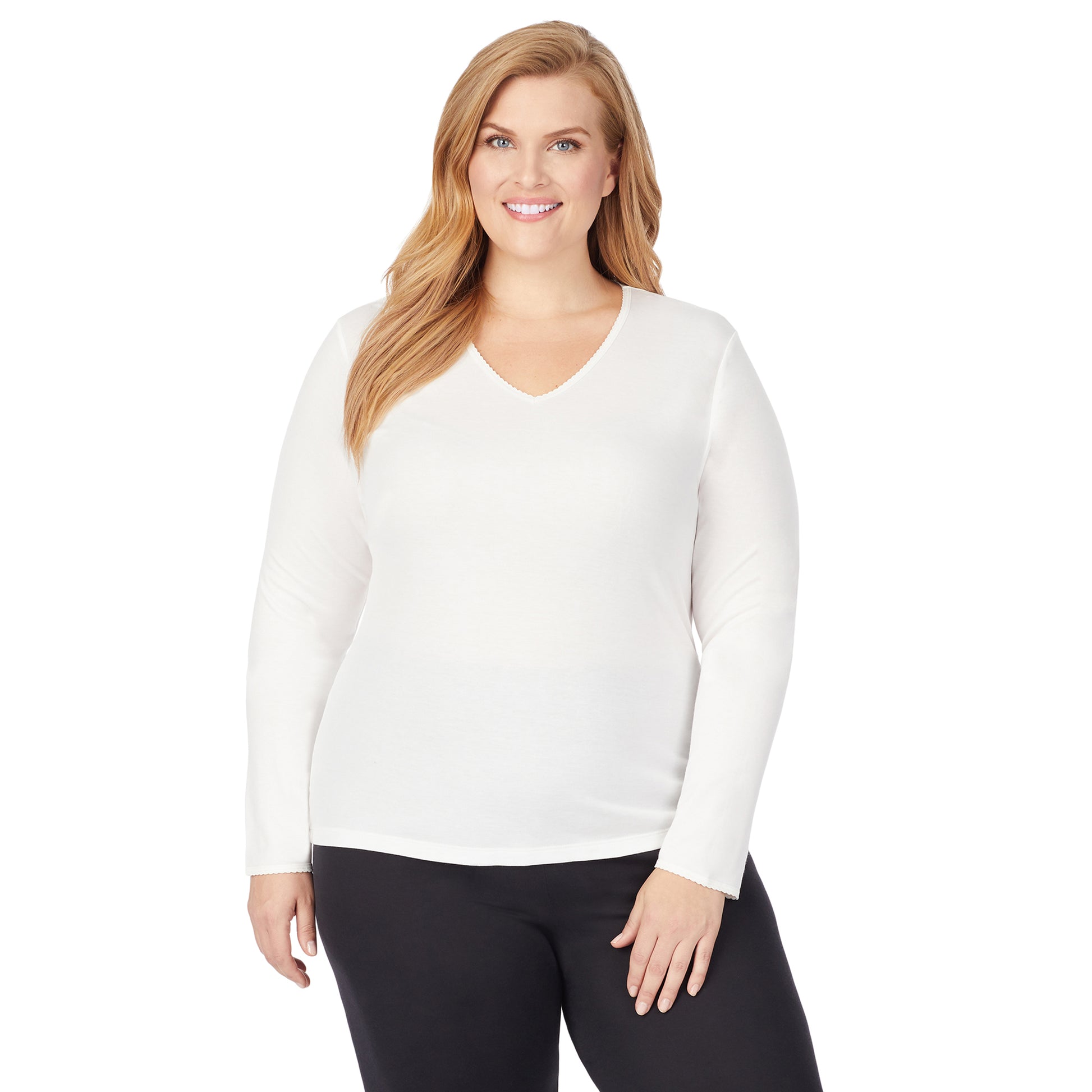A lady wearing a ivory long sleeve lace edge V-neck plus.