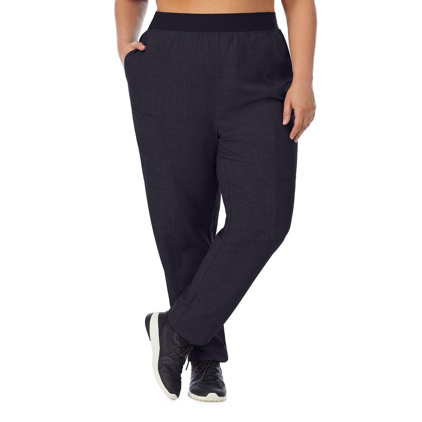 Black;Model is wearing size 1X. She is 5’7”, Bust 42.5”, Waist 34.5”, Hips 46”.@ A lady wearing black scrub slim cargo pant plus.