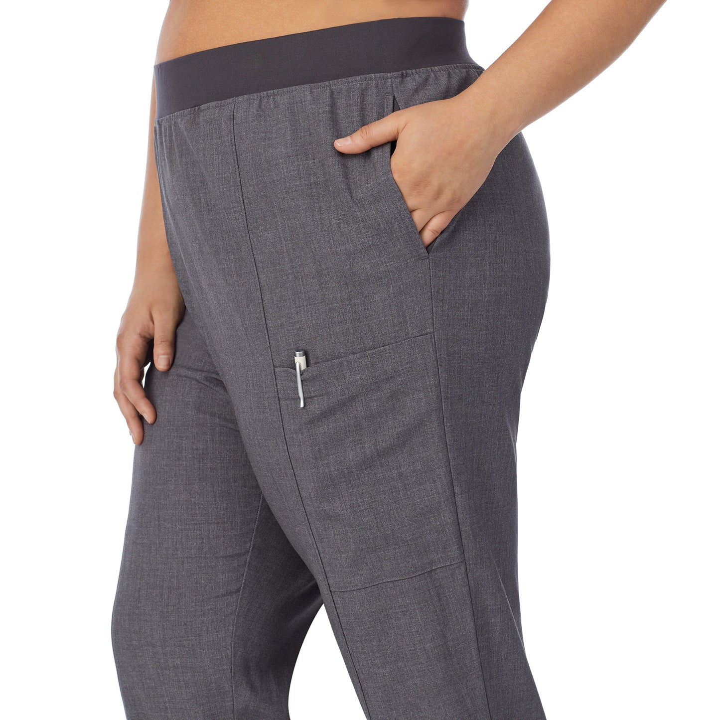 Charcoal Heather;Model is wearing size 1X. She is 5’7”, Bust 42.5”, Waist 34.5”, Hips 46”.@ A lady wearing charcoal heather scrub slim cargo pant plus.