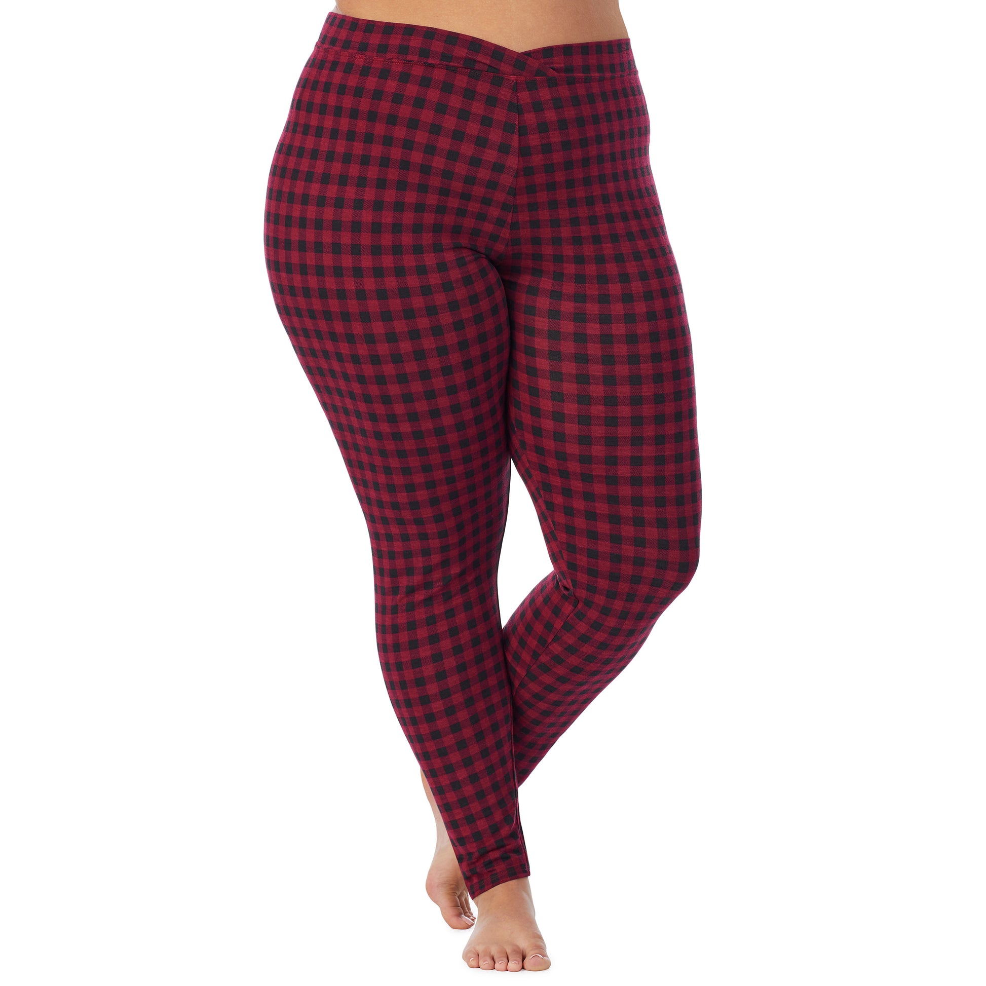 A lady wearing a red buffalo stretch legging plus.