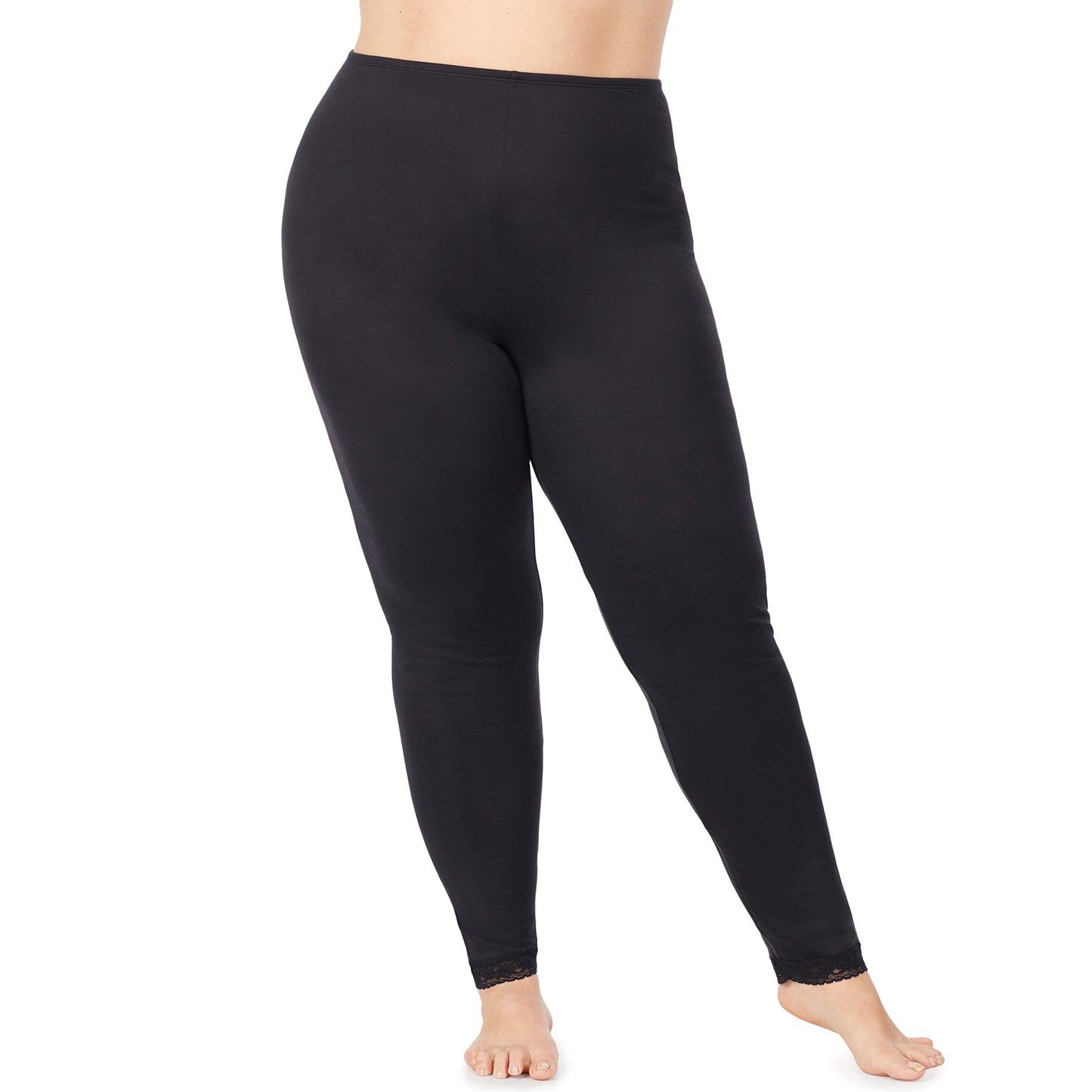 Black; Model is wearing size 1X. She is 5'9", Bust 38", Waist 36", Hips 48.5". @A lady wearing a black lace edge legging plus.