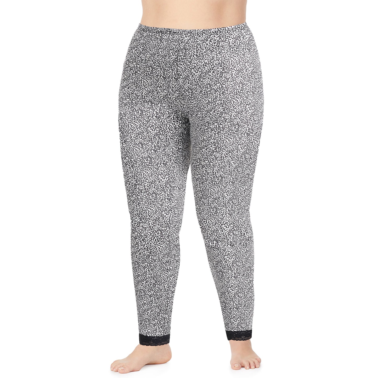 Cheetah; Model is wearing size 1X. She is 5'9", Bust 38", Waist 36", Hips 48.5". @A lady wearing a cheetah lace edge legging plus.