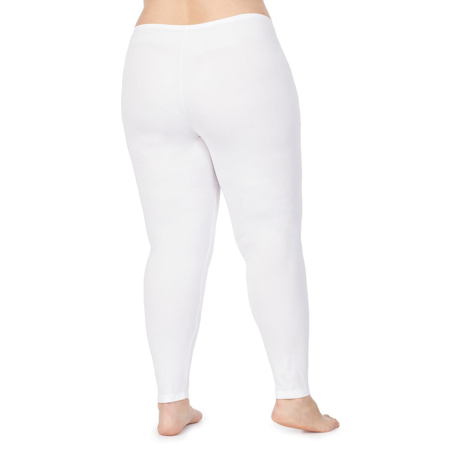 White; Model is wearing size 1X. She is 5'9", Bust 38", Waist 36", Hips 48.5".@lower body of A model wearing white legging