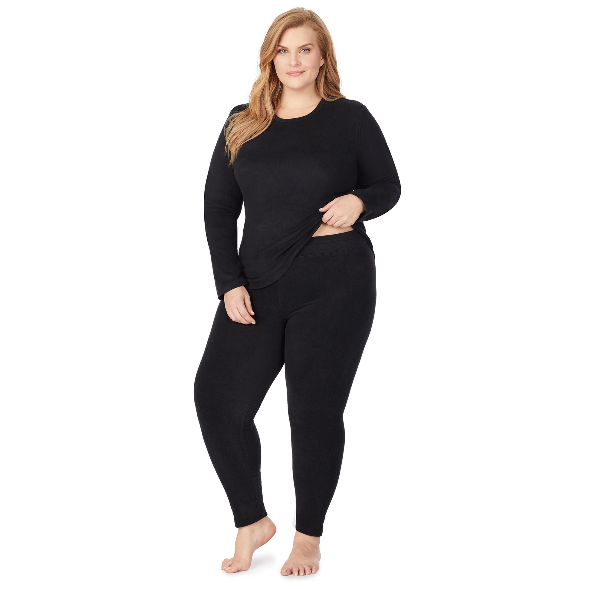 Black; Model is wearing size 1X. She is 5'9", Bust 38", Waist 36", Hips 48.5".@ a lady wearing black legging