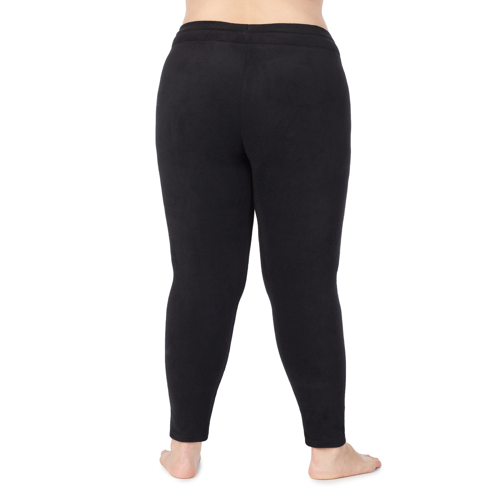 Black; Model is wearing size 1X. She is 5'9", Bust 38", Waist 36", Hips 48.5".@lower body of a lady wearing black legging