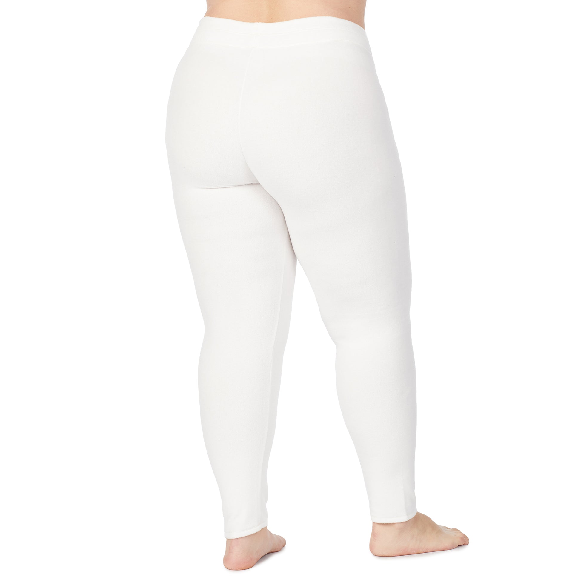 lower body of a lady wearing white legging