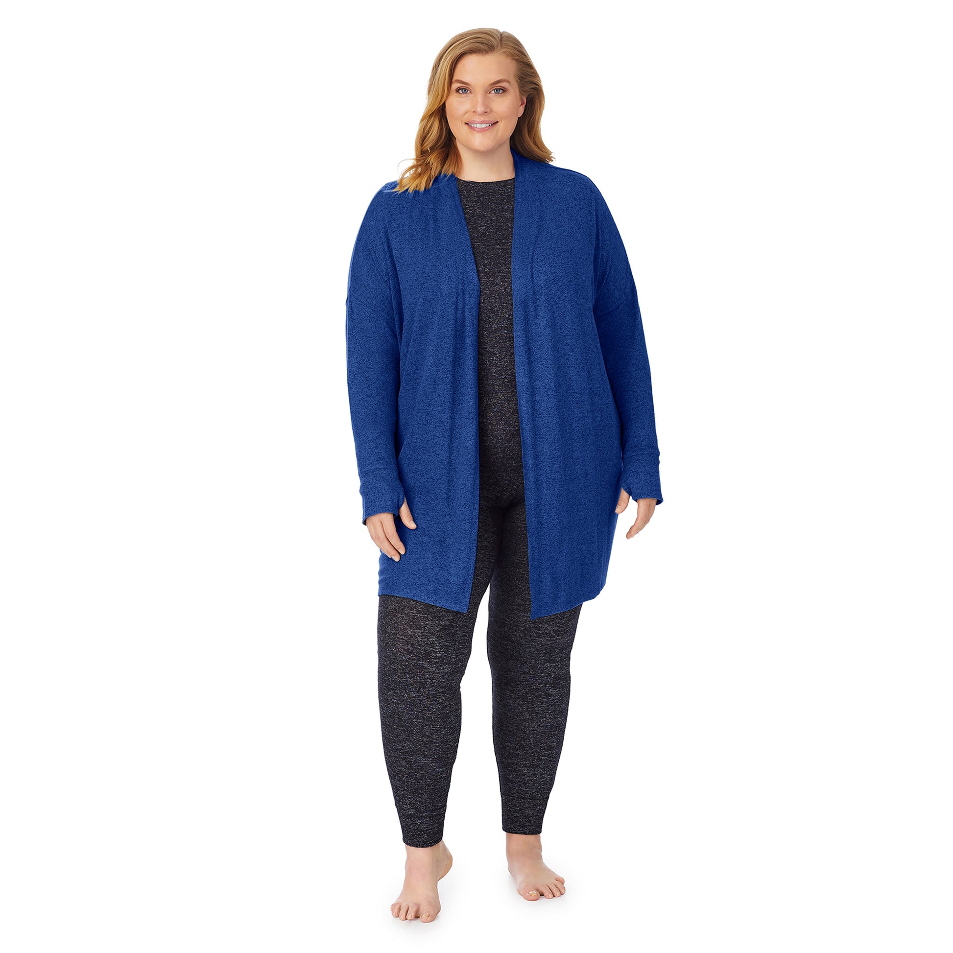 A lady wearing a marled royal blue long sleeve wrap plus.