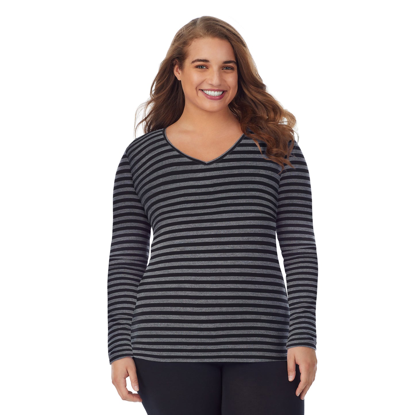 Tonal Stripe; Model is wearing size 1X. She is 5'7", Bust 42.5", Waist 34.5", Hips 46".@upper body of a lady wearing tonal stripe long sleeve v-neck top