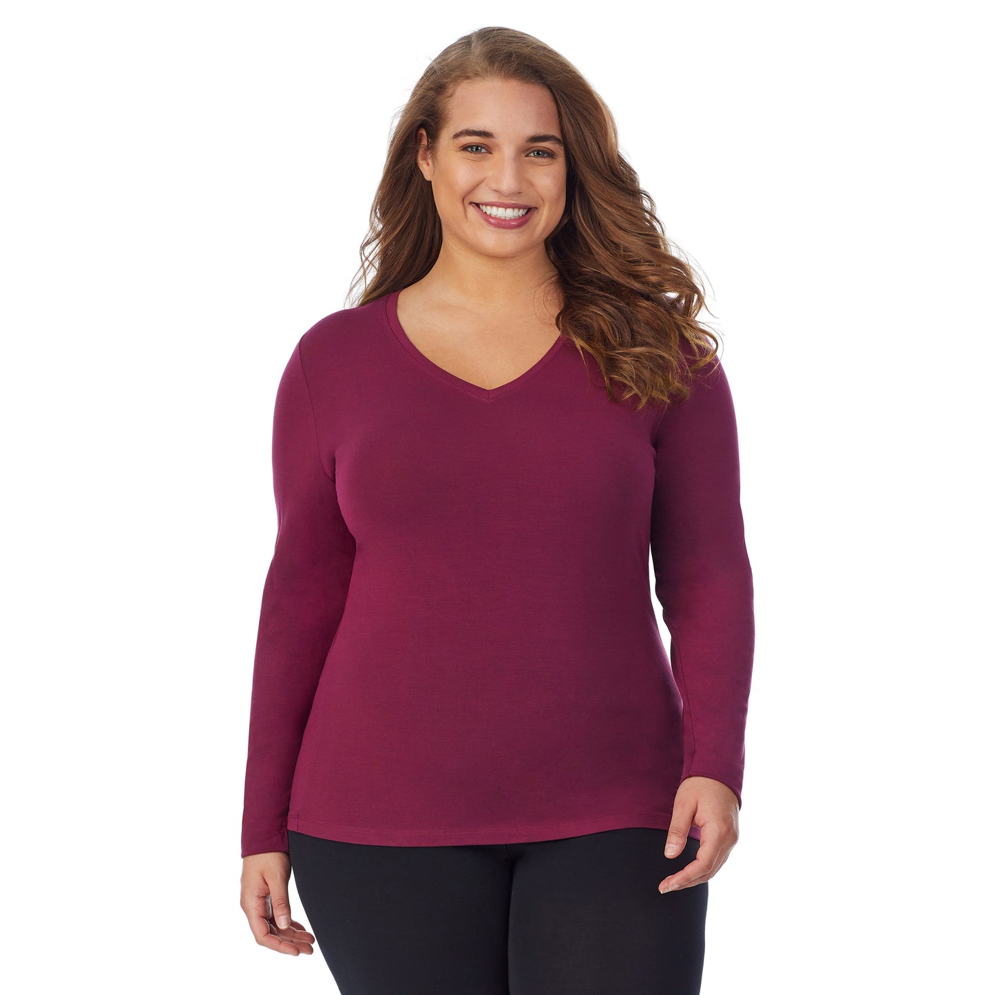 Grape; Model is wearing size 1X. She is 5'7", Bust 42.5", Waist 34.5", Hips 46".@upper body of a lady wearing grape long sleeve v-neck top