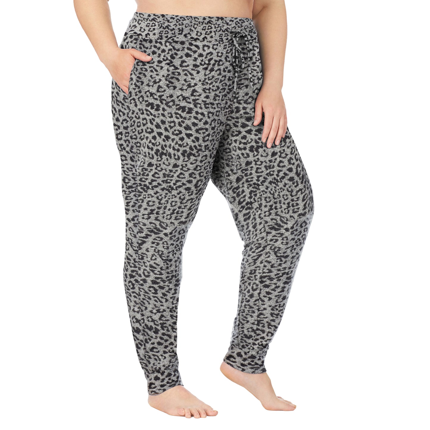 Grey Animal; Model is wearing size 1X. She is 5'9", Bust 38", Waist 36", Hips 48.5". @A lady wearing a grey animal jogger plus.
